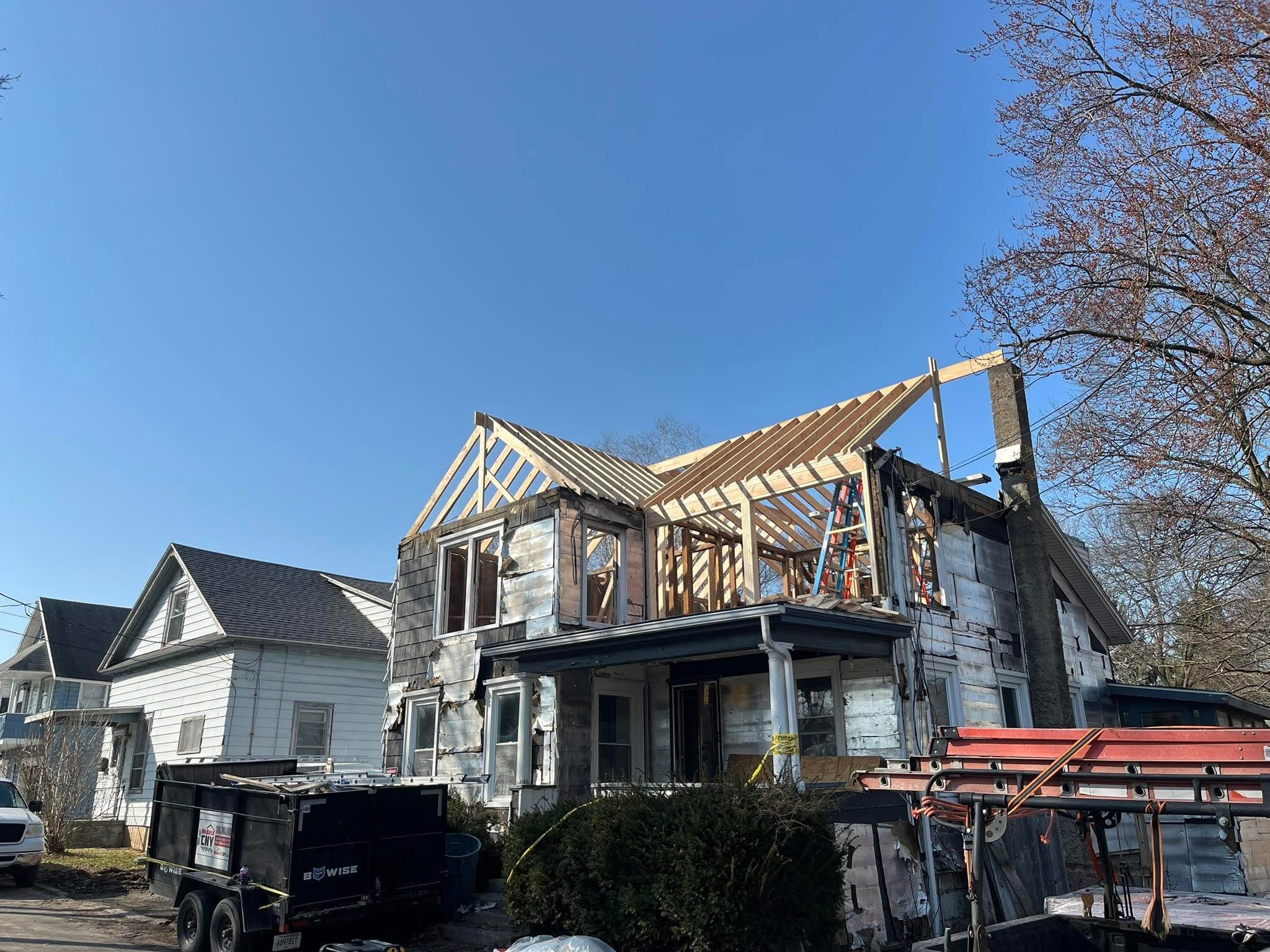 Interior wall framing and layout reconfiguration to modernize the restored living space