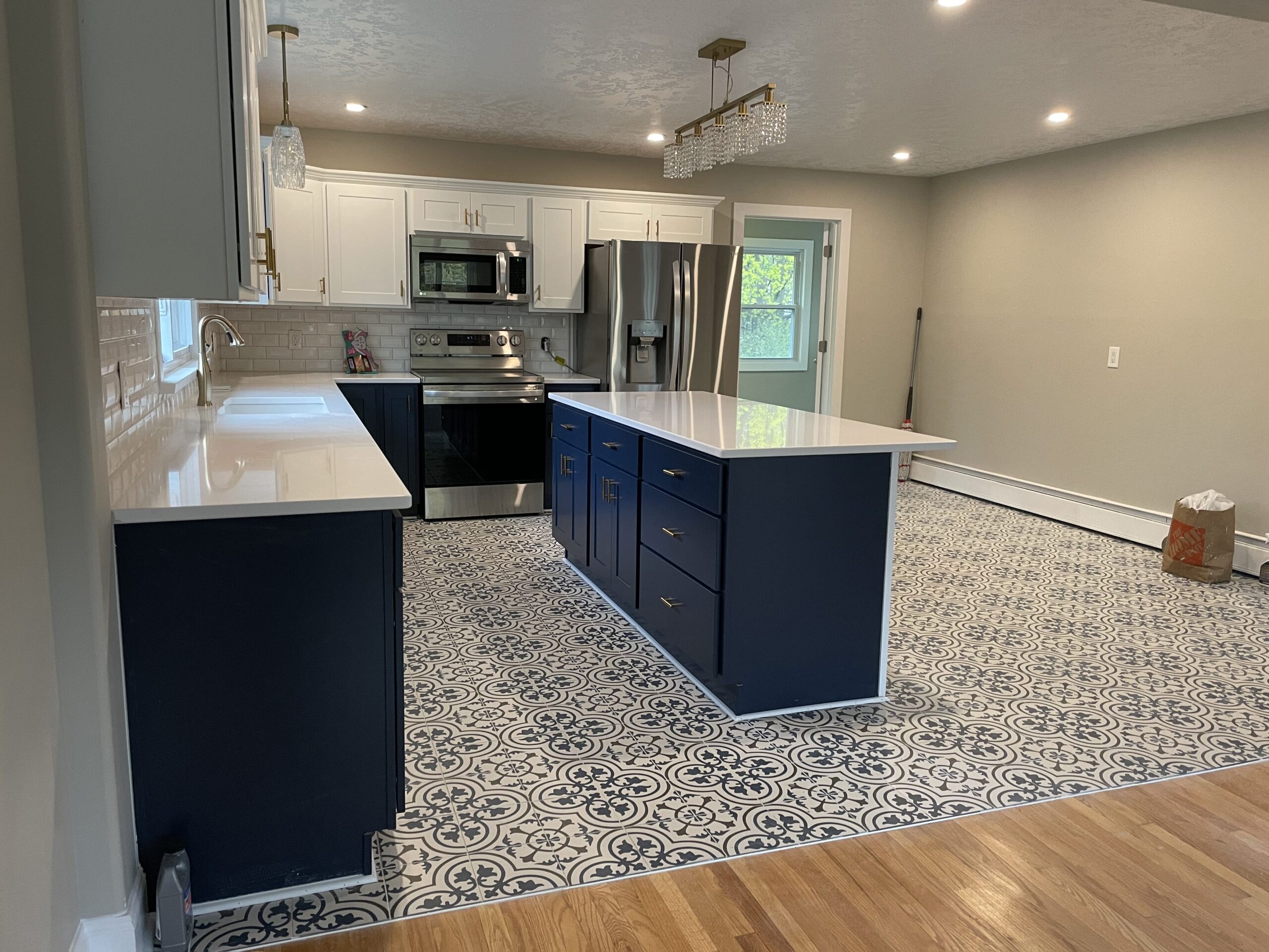 Custom lighting fixtures and recessed lighting highlighting the Auburn NY interior renovation