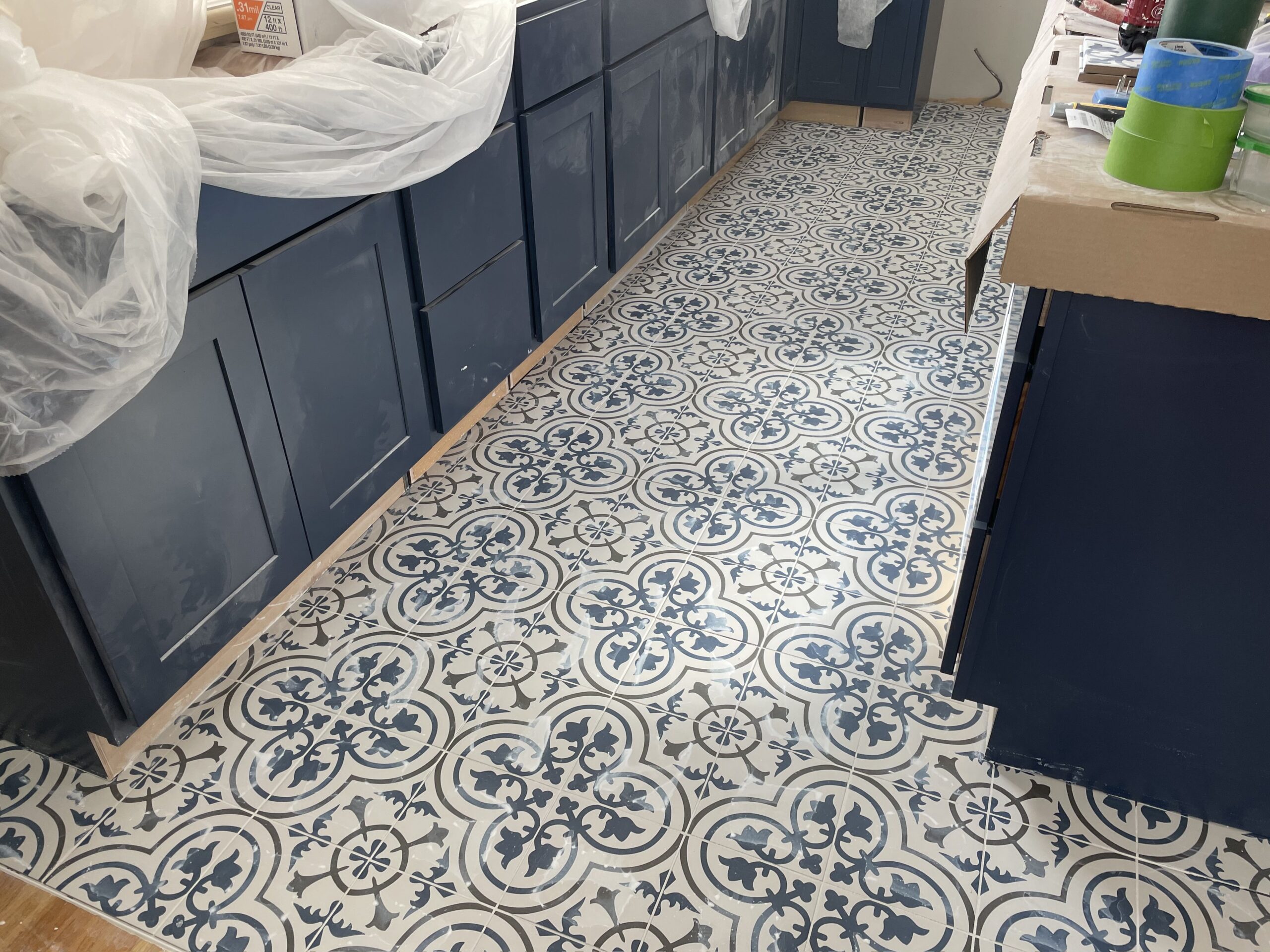 Premium luxury vinyl plank flooring installation throughout the main residential living areas