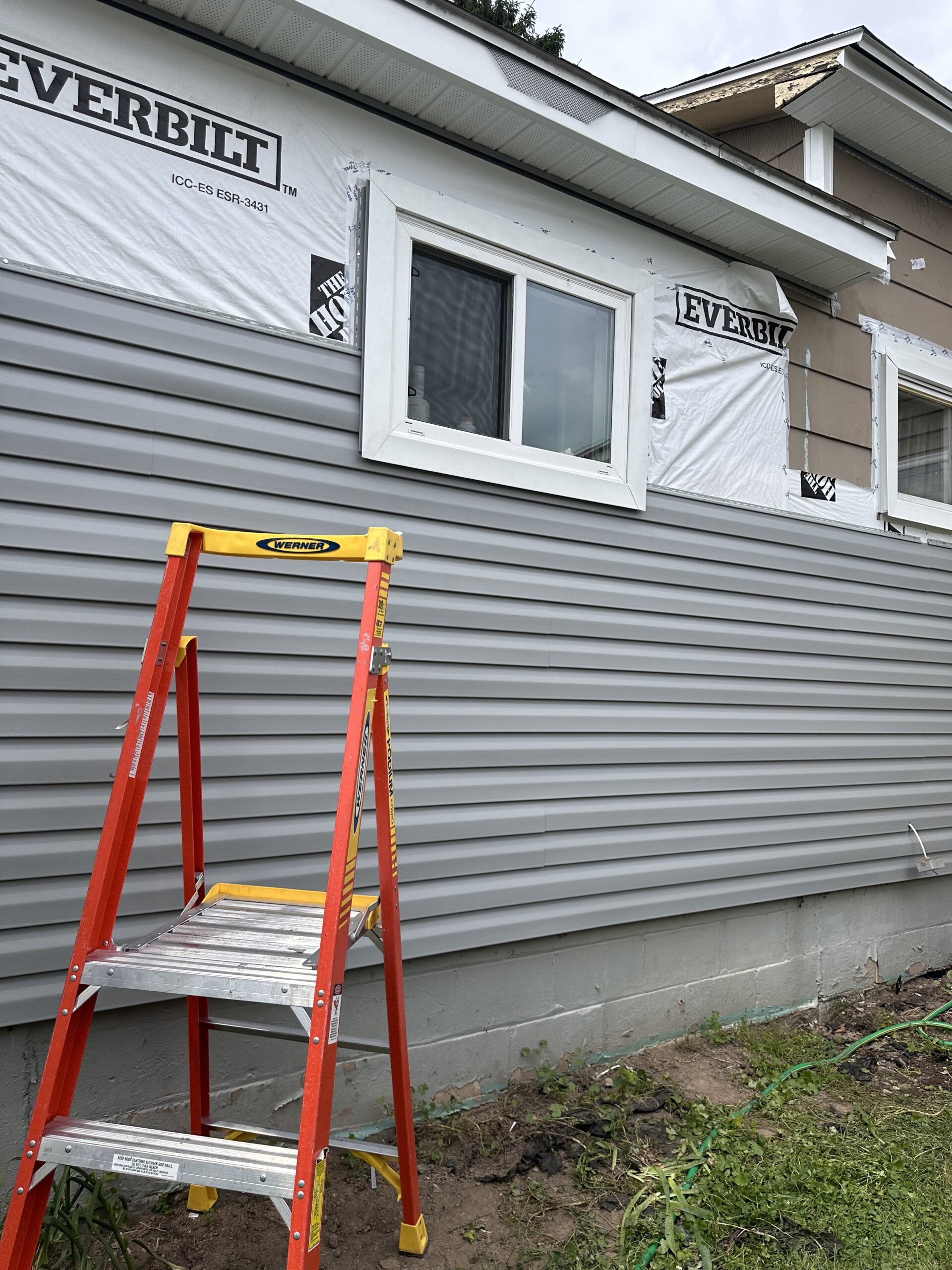 Flawless corner trim and siding installation protecting a Central NY property