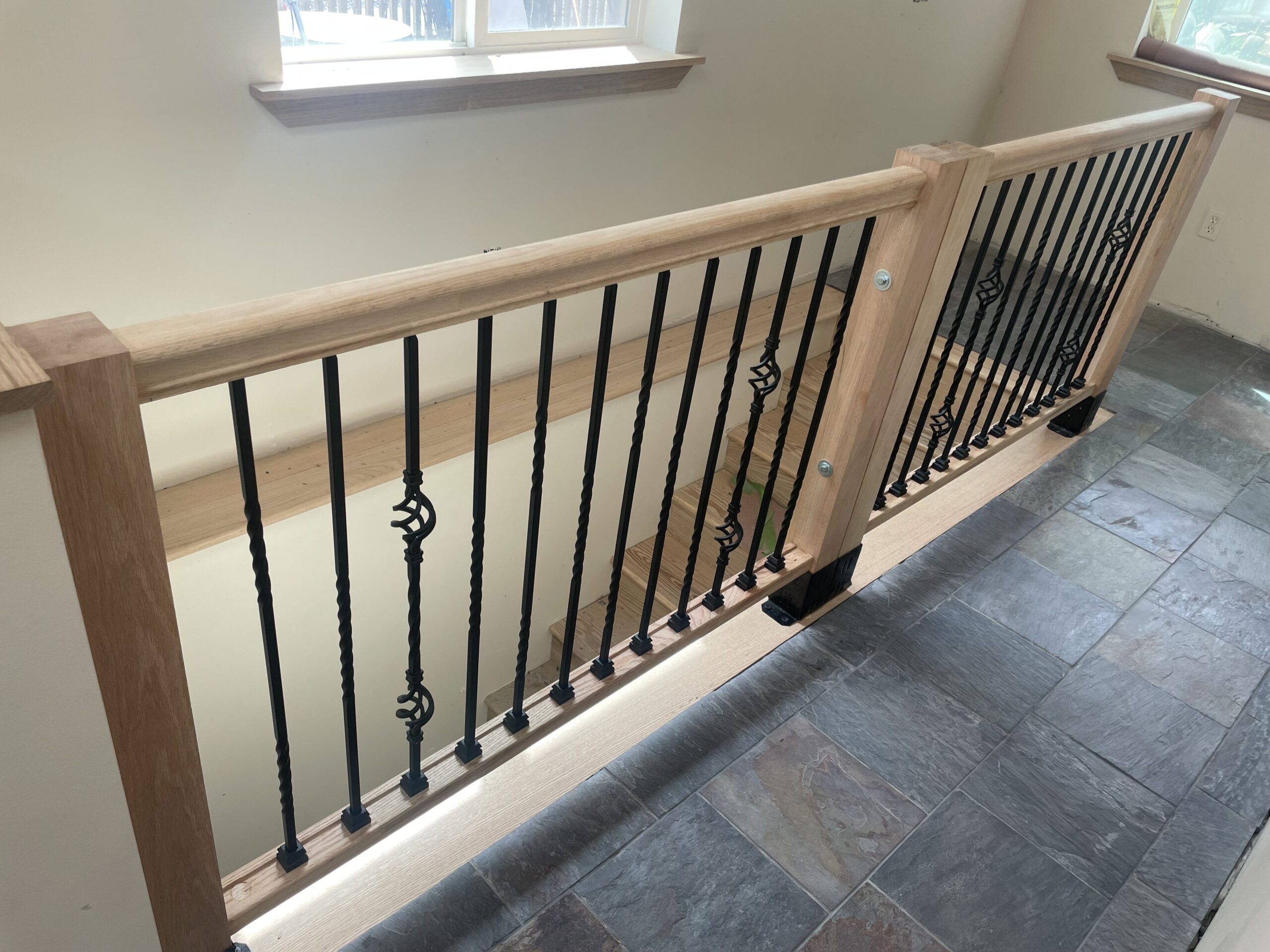Beautifully finished hardwood stairs and custom handrails in a Cayuga County home