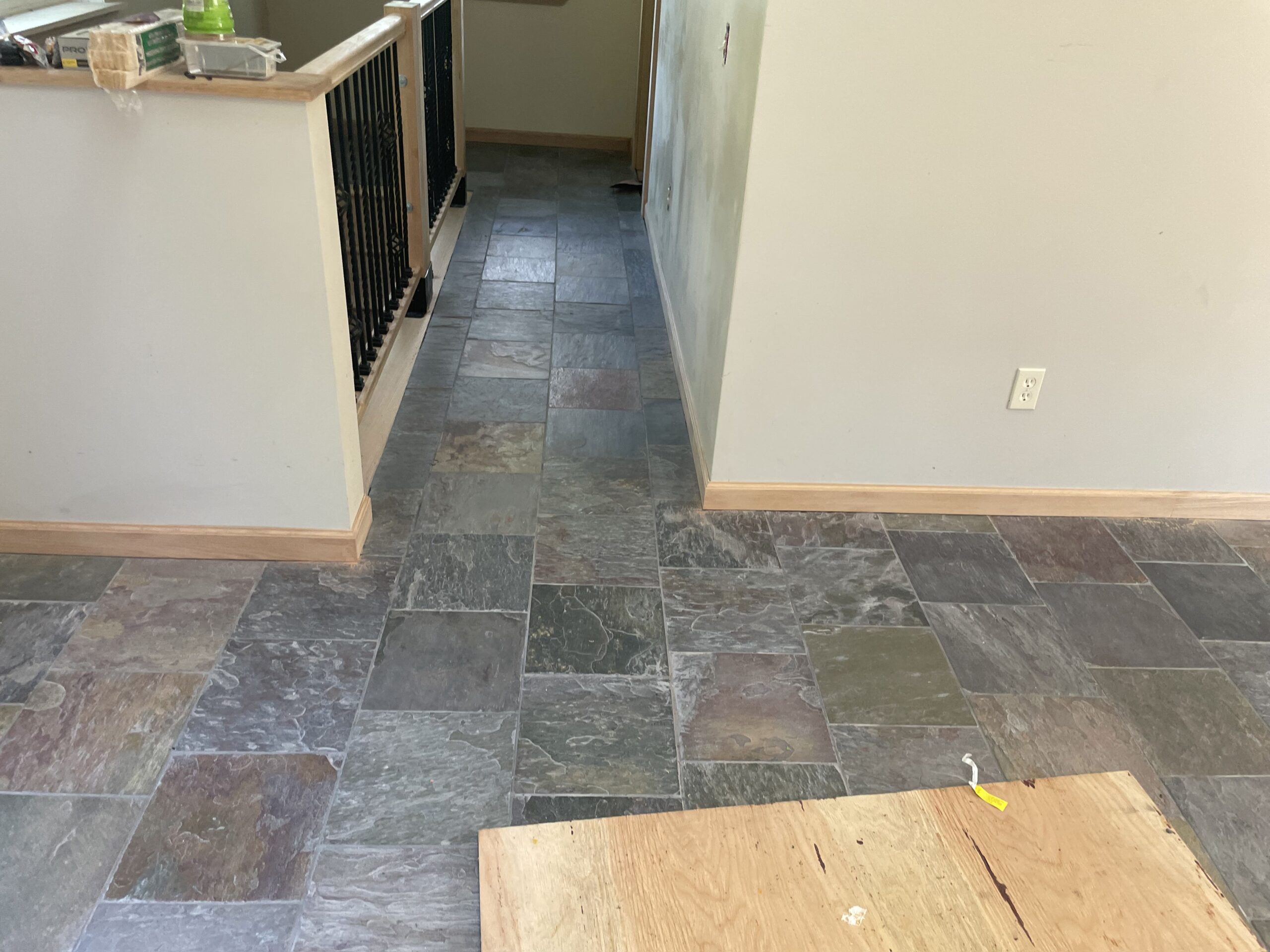 Seamless transition of custom stair railing to the second-floor landing