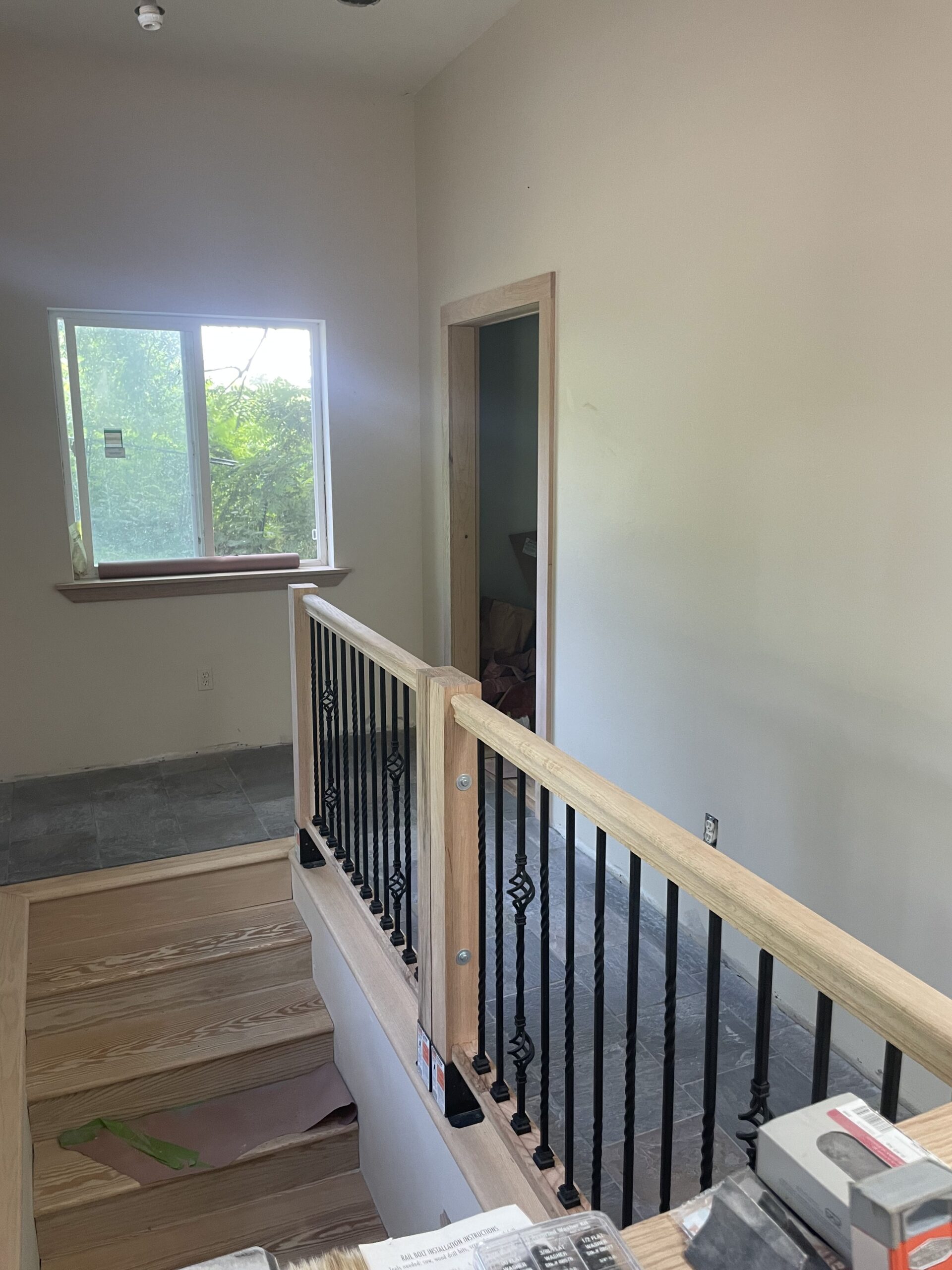 High-quality stained wood handrails paired with painted balusters for a modern look