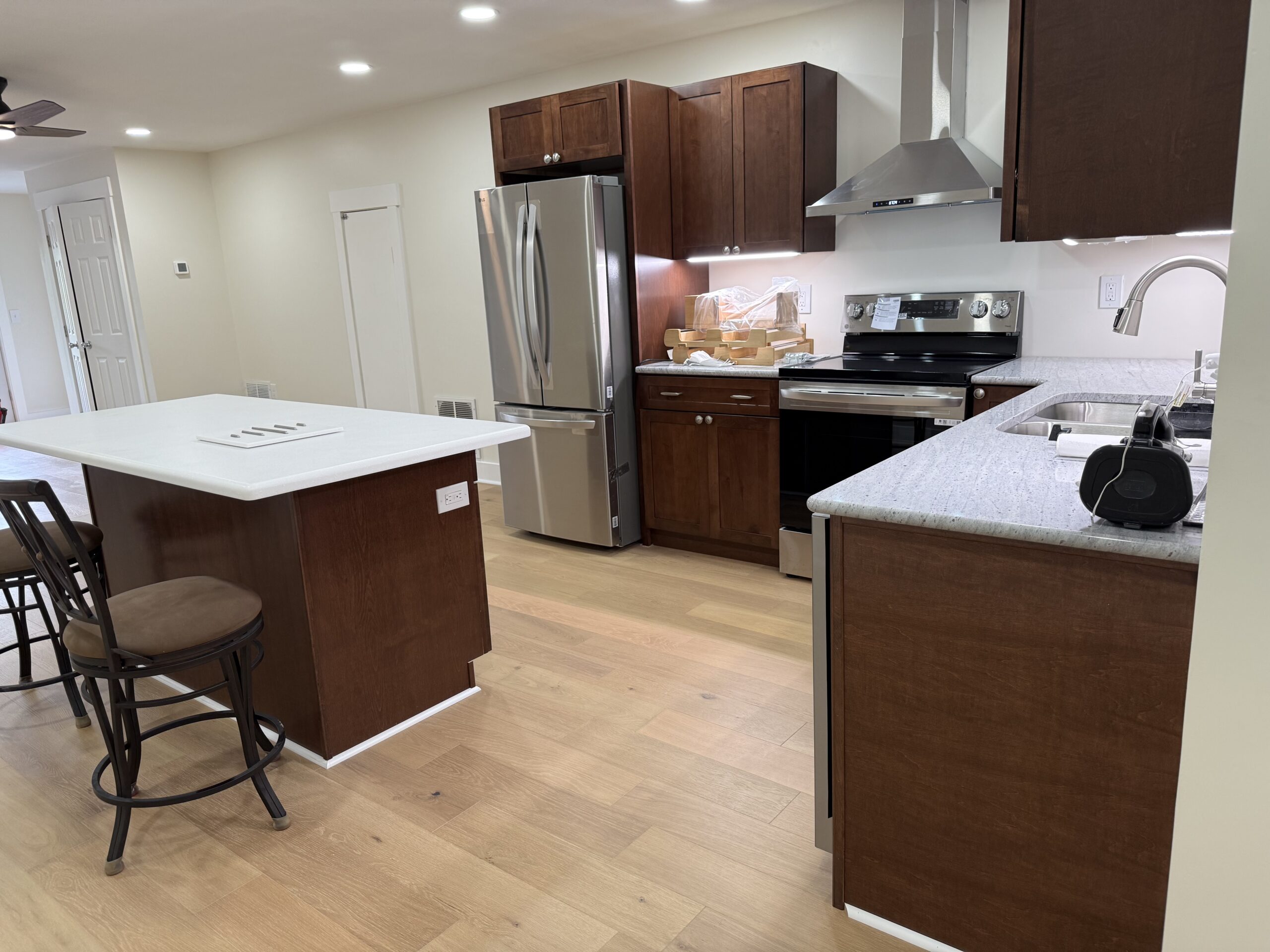 Exterior siding, roofing, and structural upgrades on the modern barndominium remodel