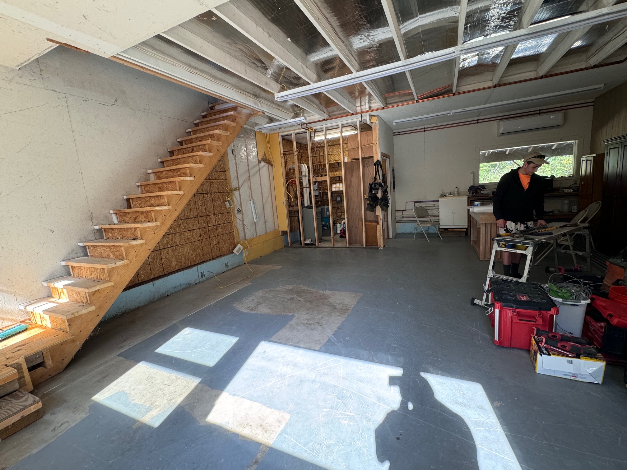 Unfinished, open interior space requiring a complete multi-family residential conversion