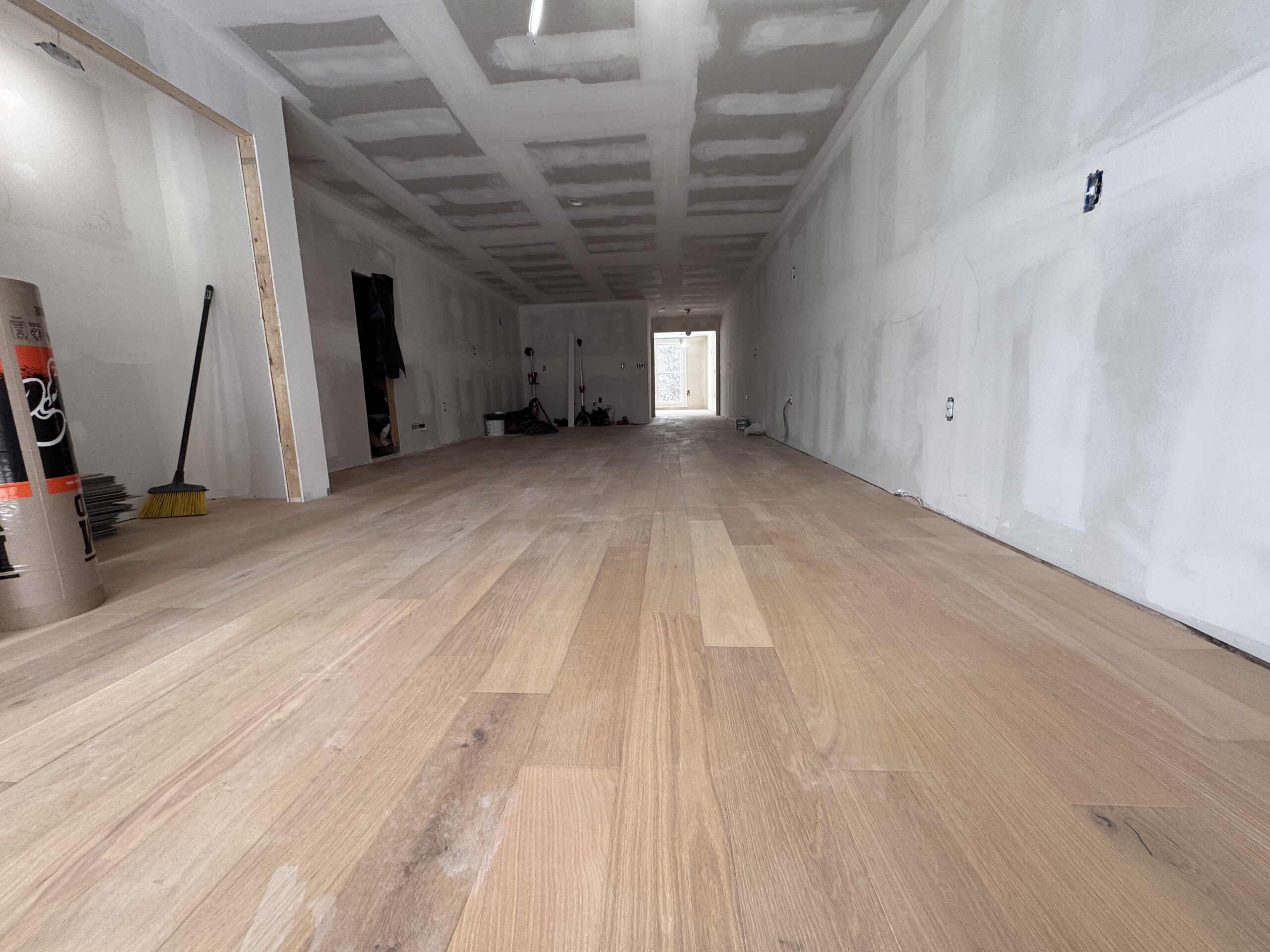 Installing modern plumbing fixtures and lighting in the barn conversion project