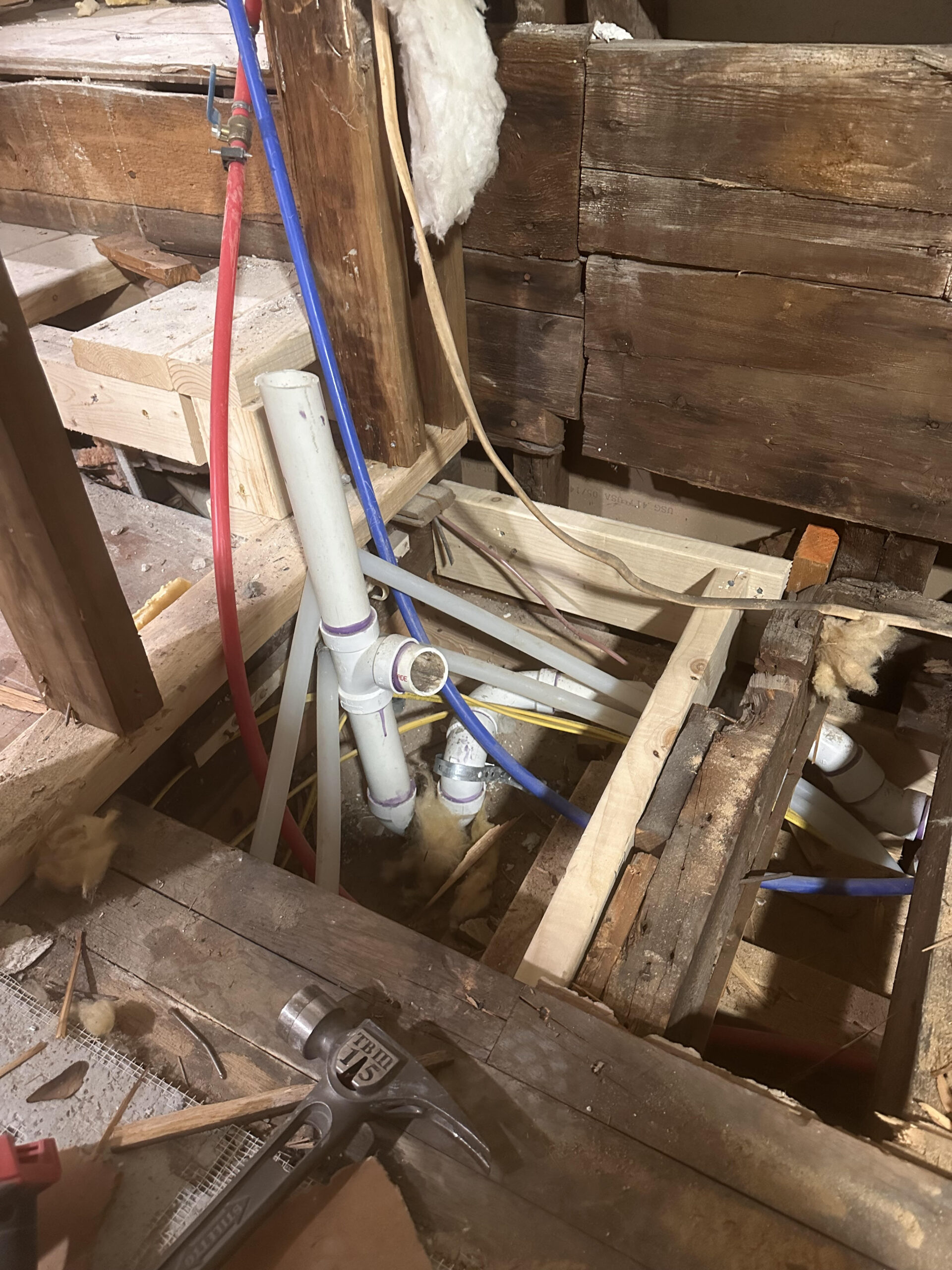 Pre-construction view of an aging bathroom in need of a luxury upgrade