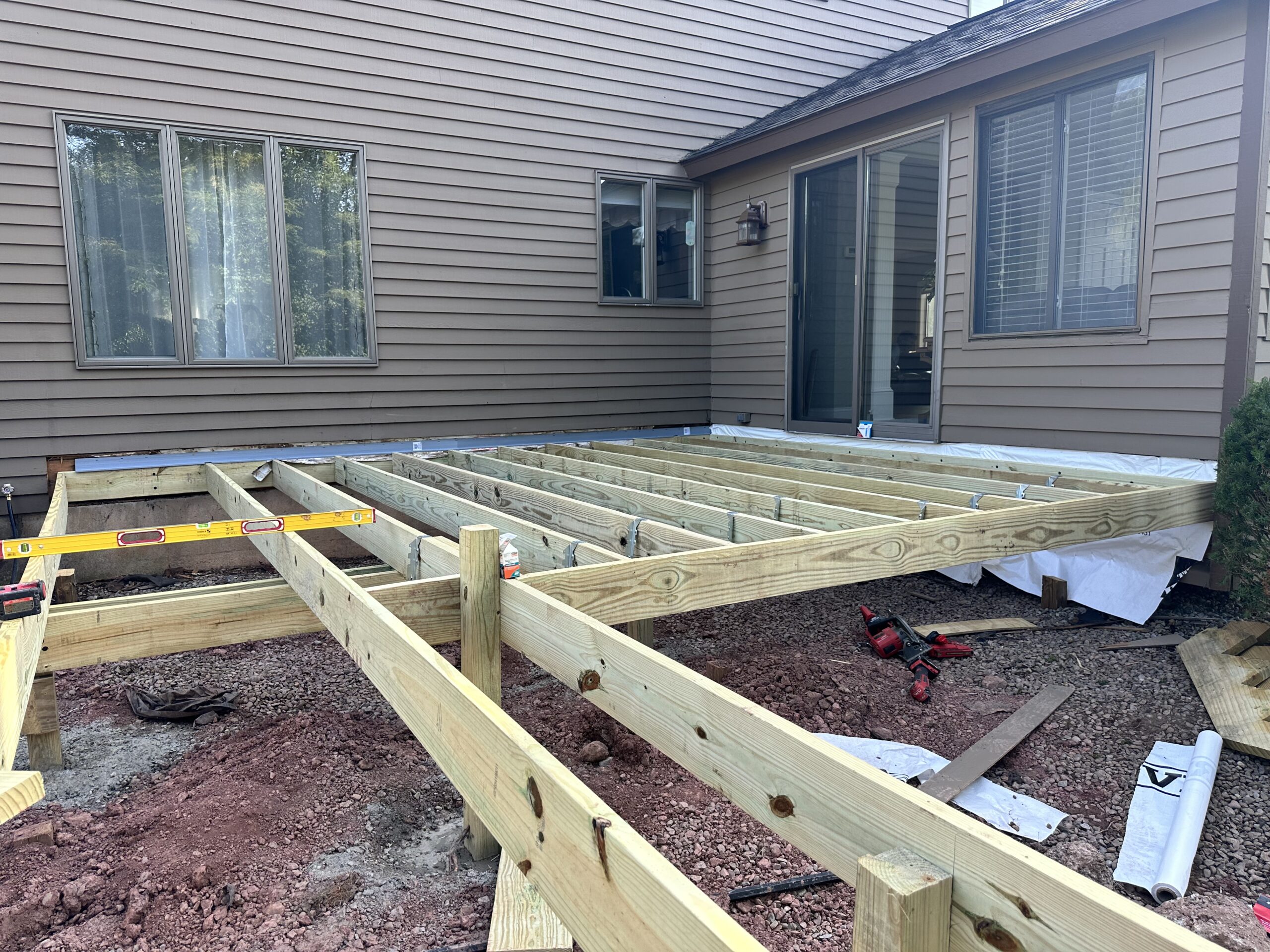 Structural framing and joist preparation for a new TimberTech composite deck in Liverpool NY