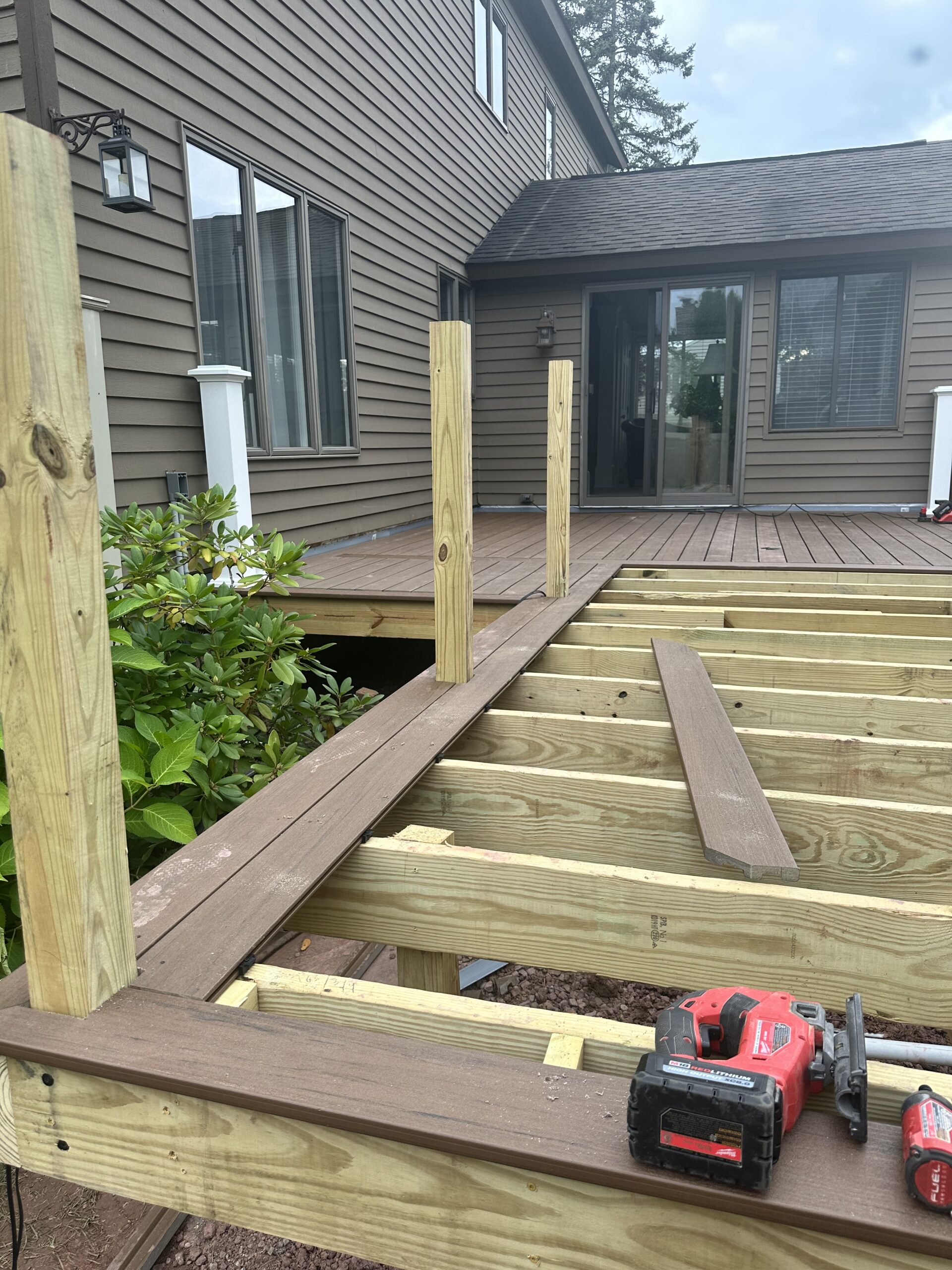 WeBuild CNY deck builders installing premium TimberTech composite deck boards