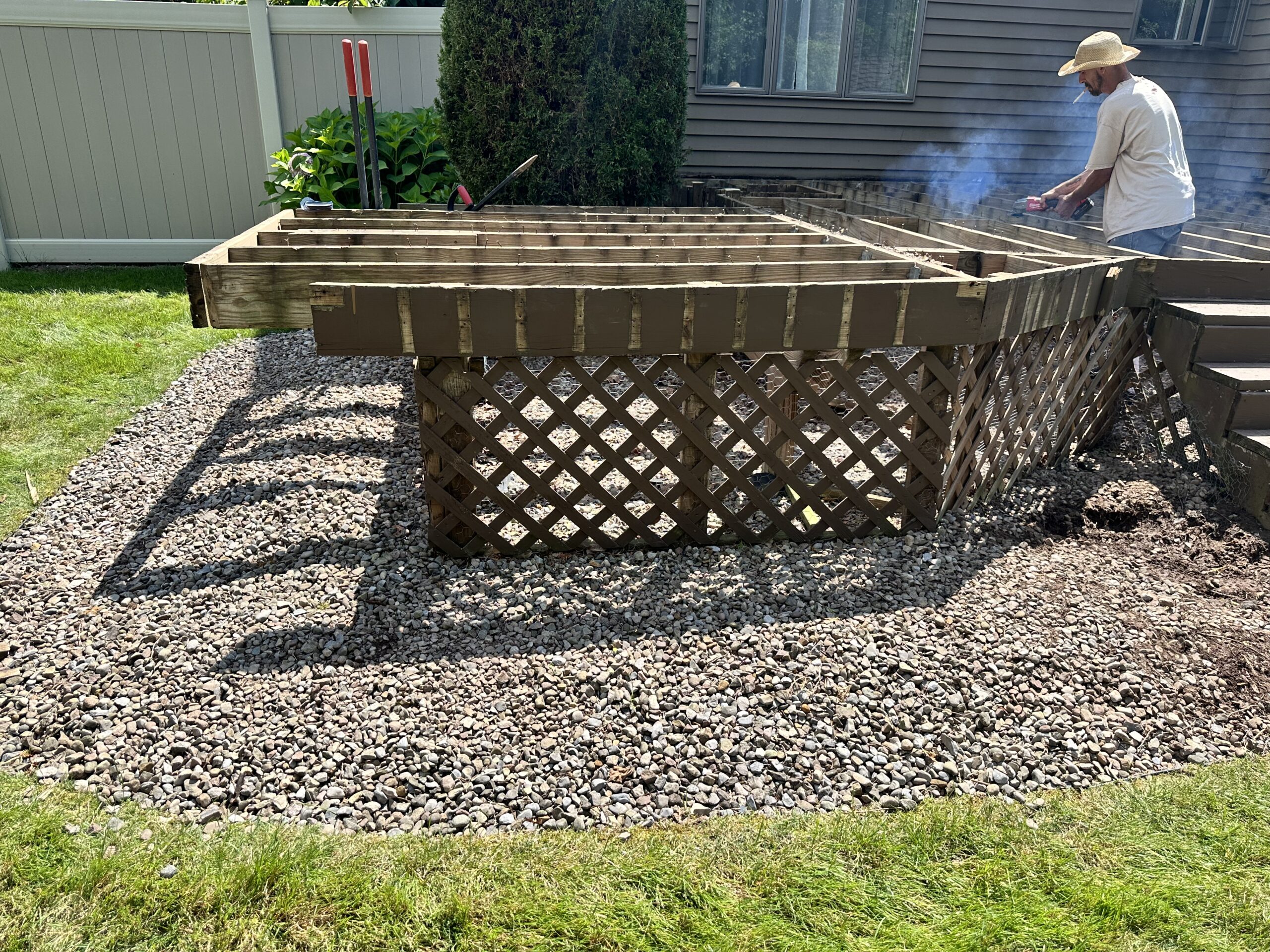 Deteriorating residential deck structure before WeBuild CNY's premium remodeling services