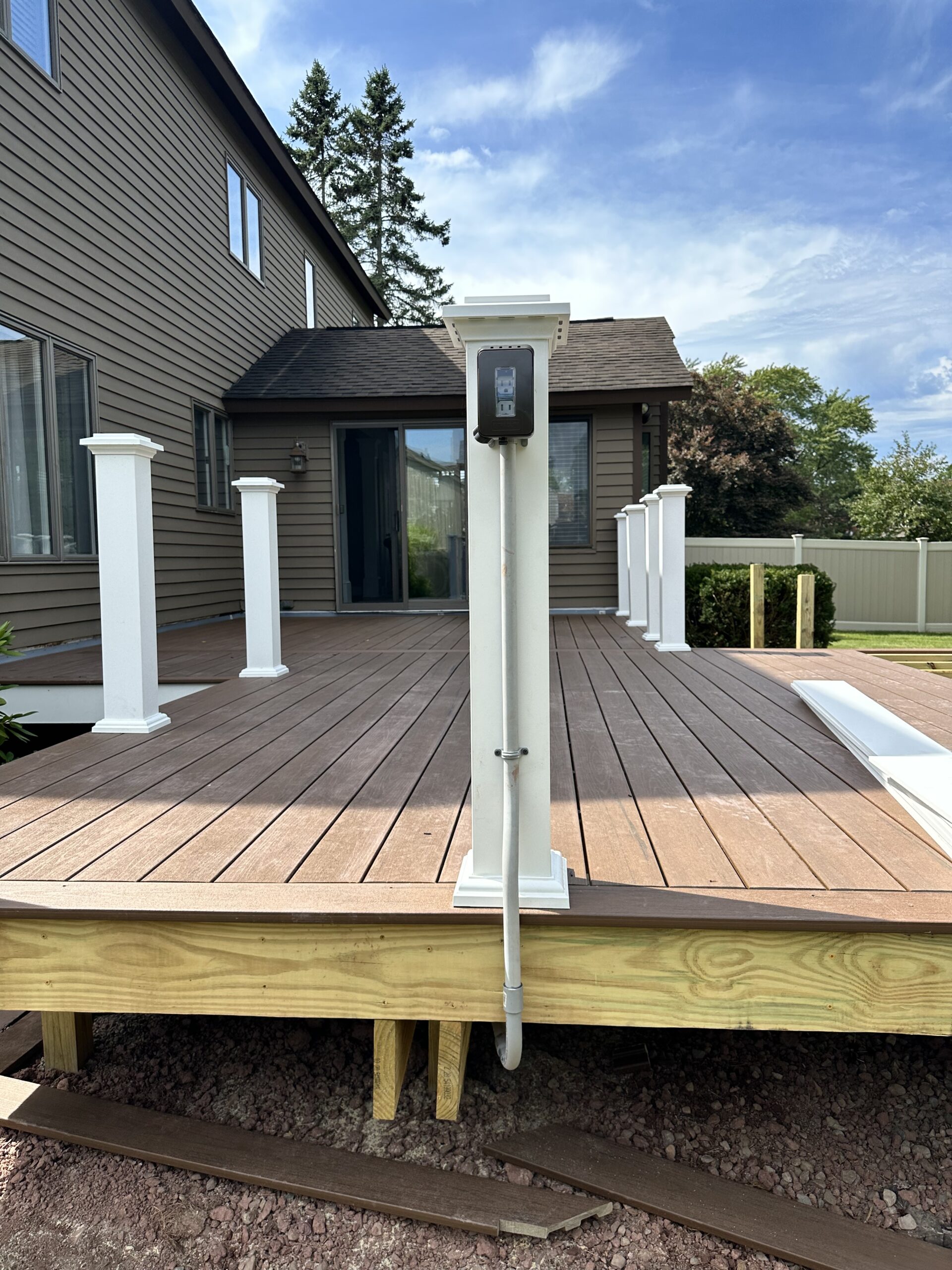 Construction progress of a residential backyard deck remodel in Onondaga County