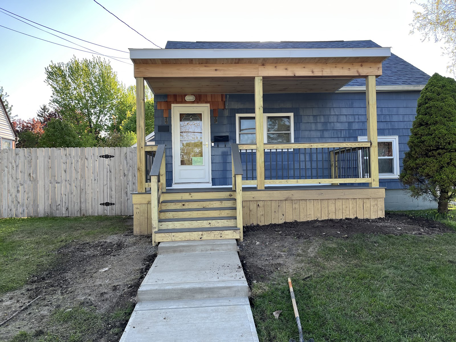 Beautifully completed 8x16 covered Timbertech composite deck built by WeBuild CNY in Auburn, NY