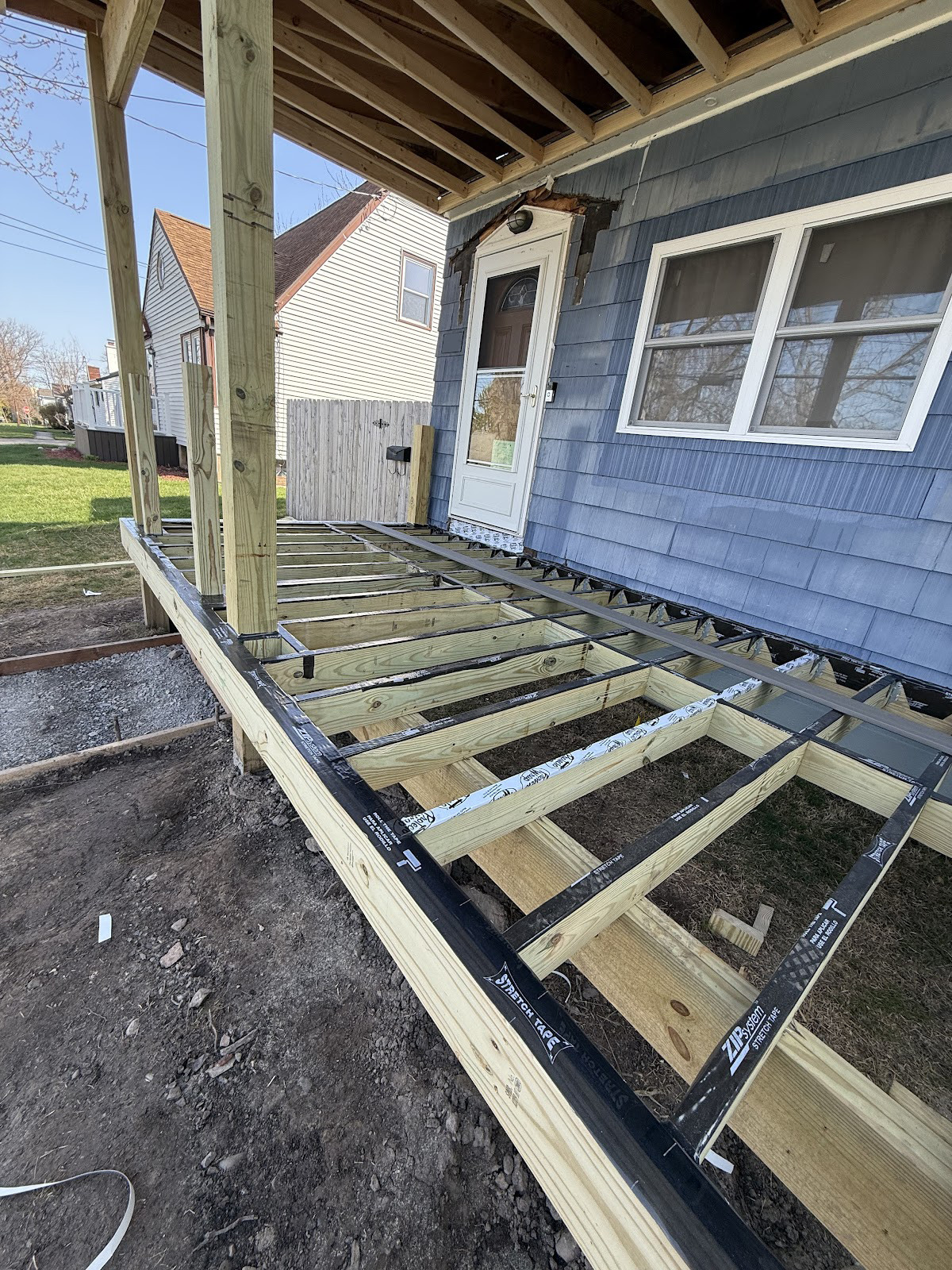 WeBuild CNY contractors installing high-end Timbertech composite decking and cedar soffit materials