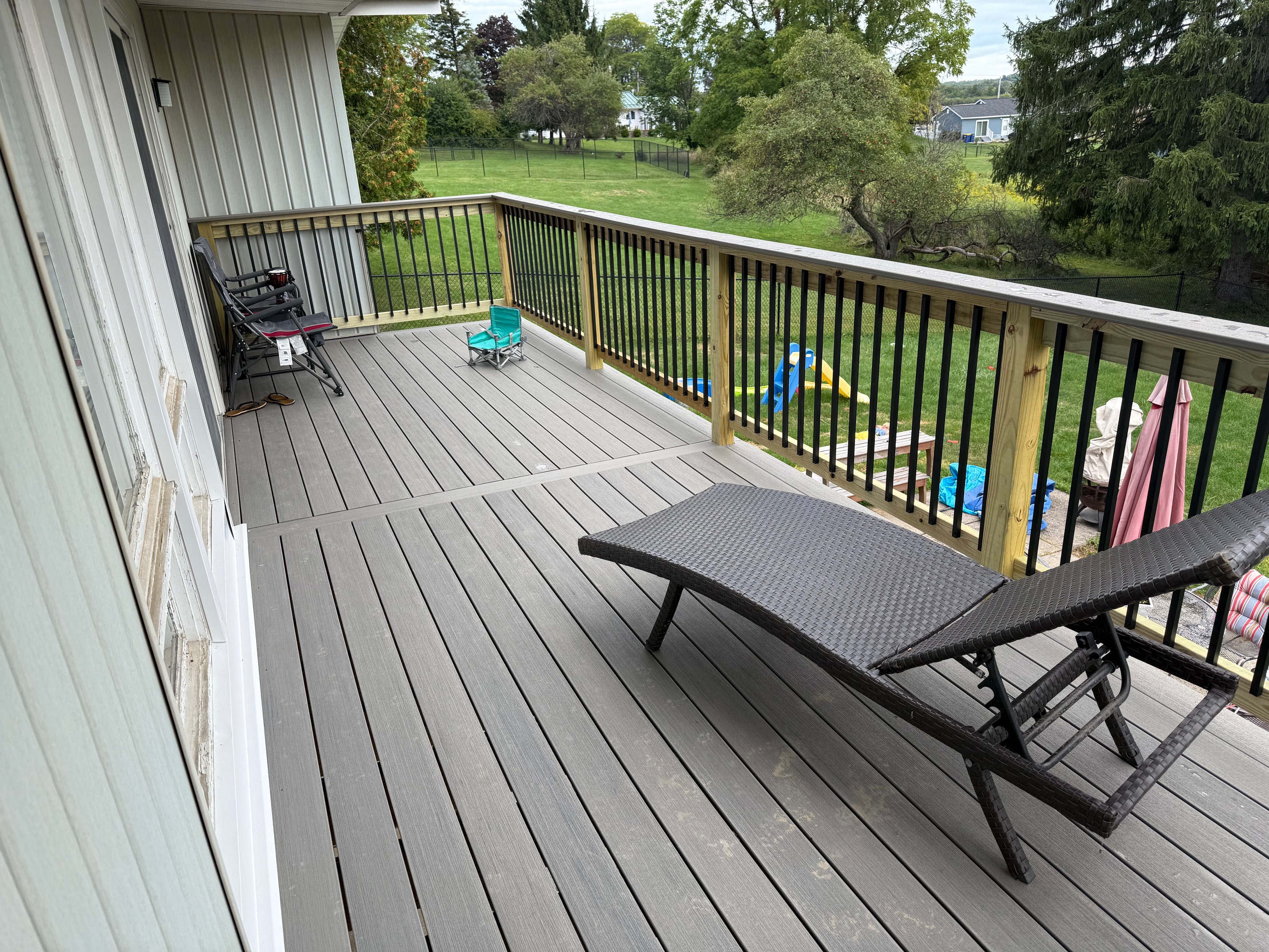 Expansive 24-foot TimberTech composite deck in Sea Salt Grey built in Owasco, New York
