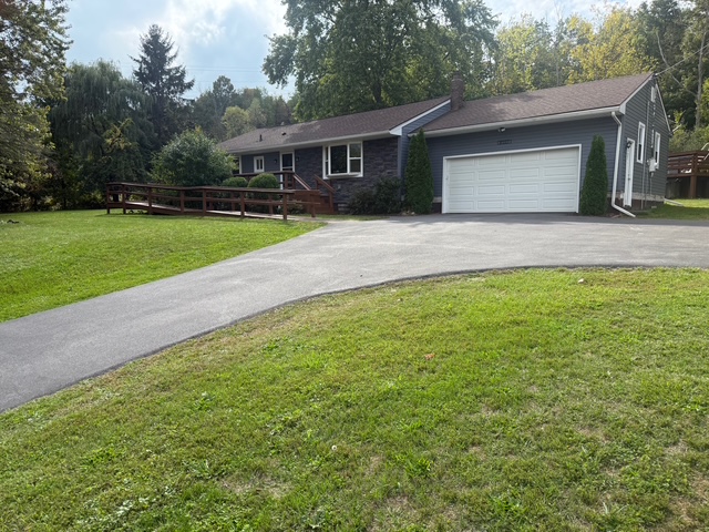 Beautifully completed exterior transformation with new Flagstone vinyl siding in Port Byron, NY