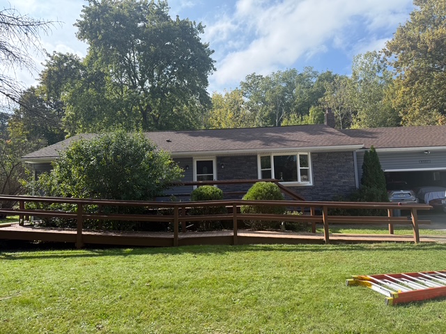 Custom roof extension and covered patio area for improved outdoor living