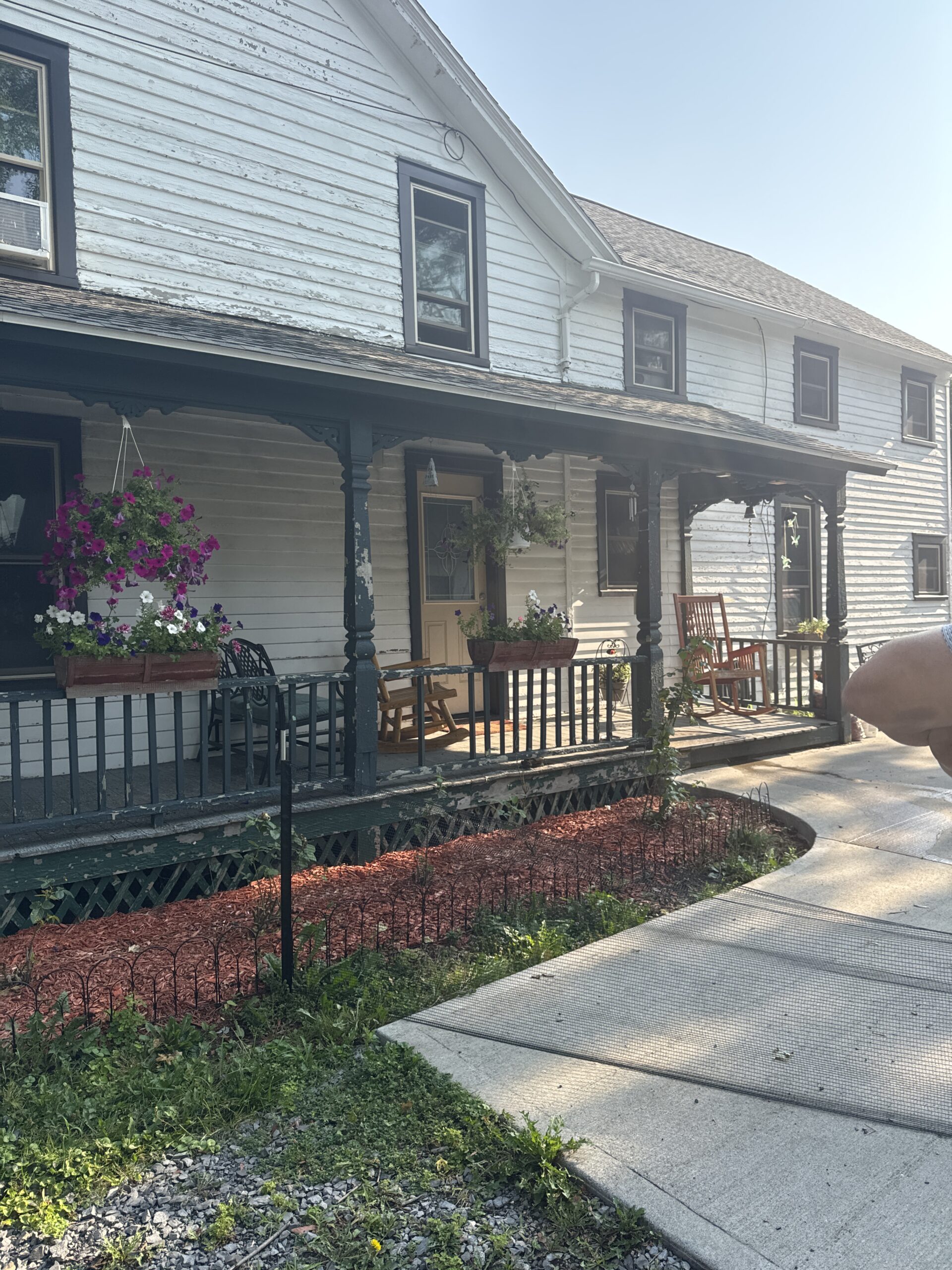 Outdated and unsafe historic porch steps and decking prior to WeBuild CNY restoration services