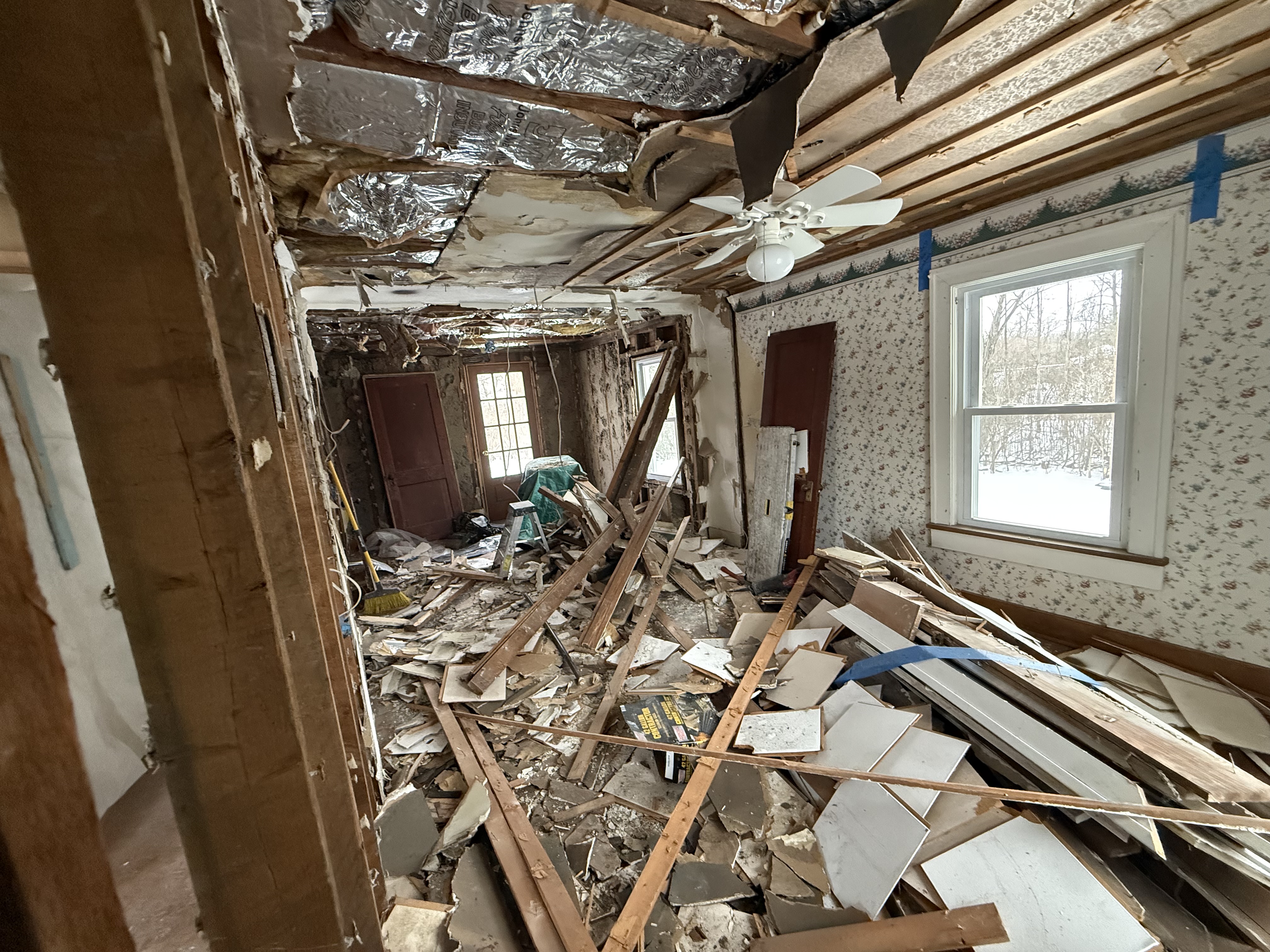 Structural wall removal and framing process for an open concept home remodel