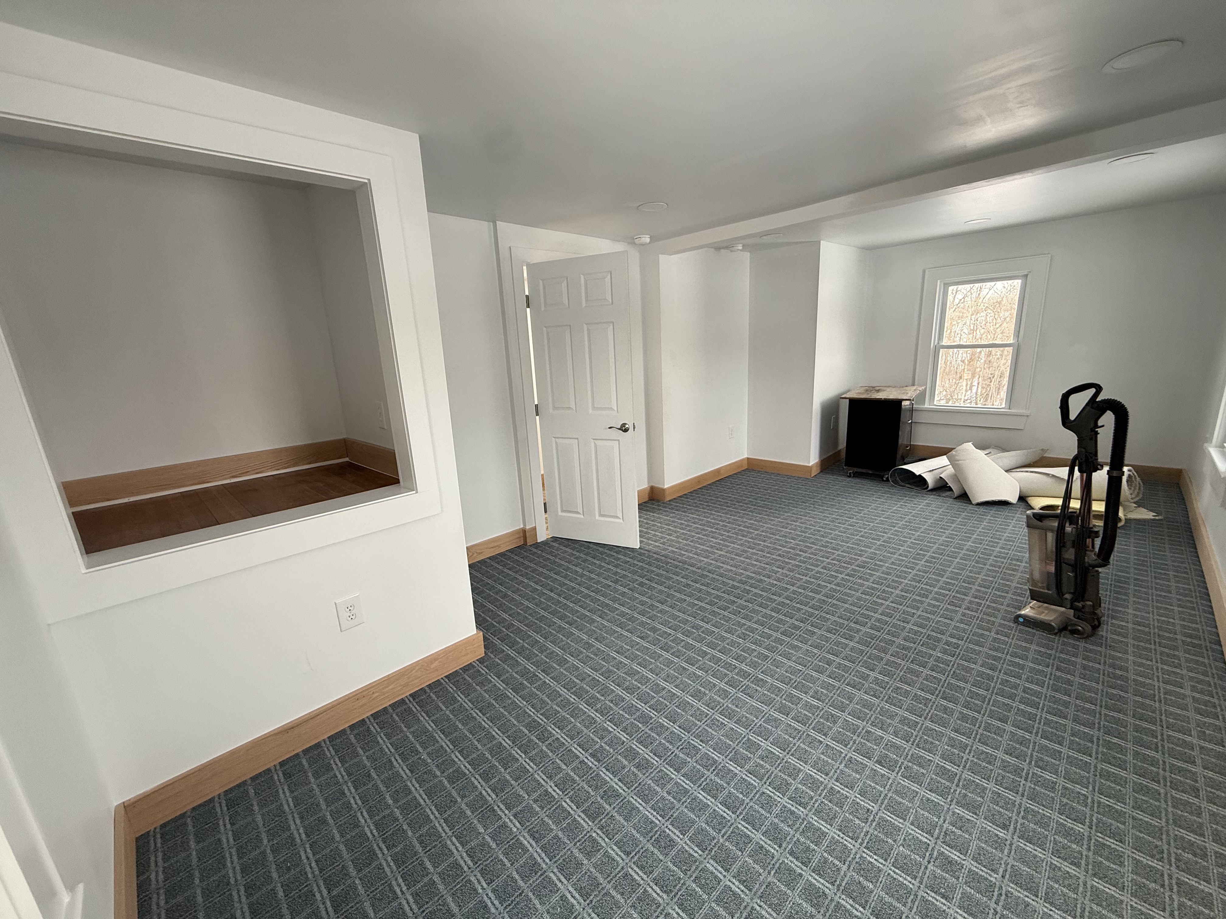 Spacious 2-bedroom conversion featuring natural light and custom finish carpentry
