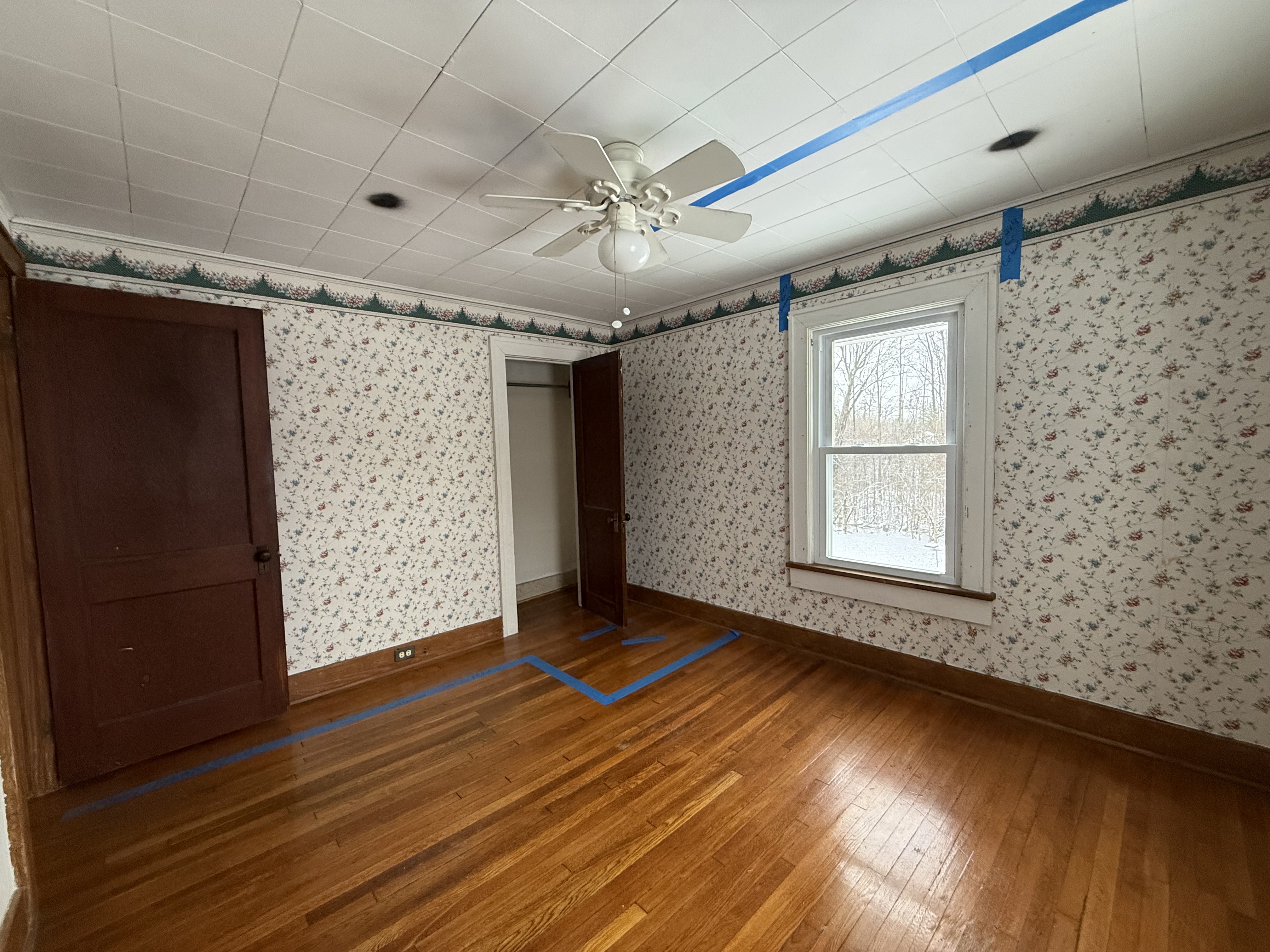 Outdated baseboards and trim in need of premium custom carpentry upgrades