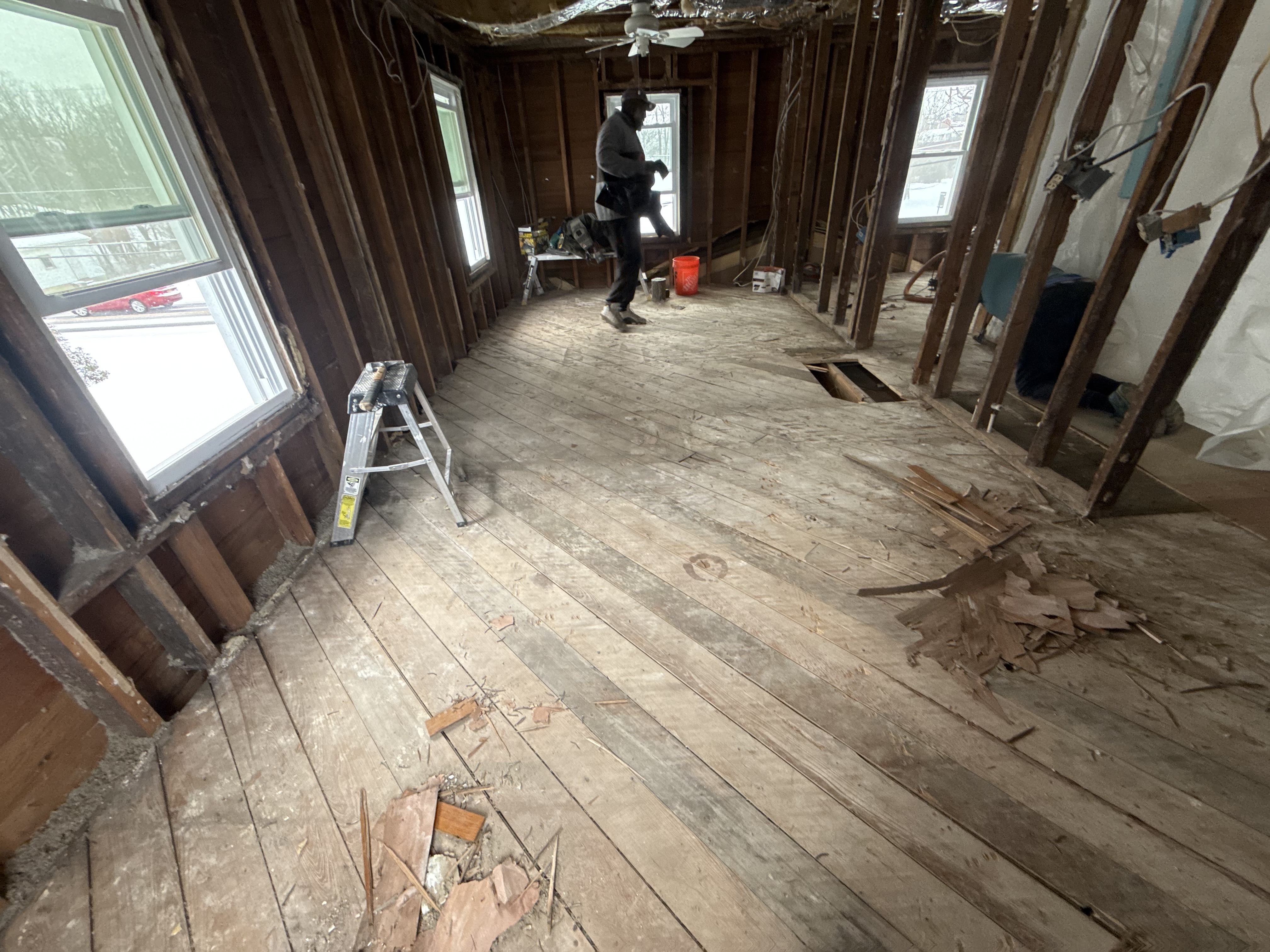 Construction of a new, code-compliant, and safer attic staircase in Cayuga County