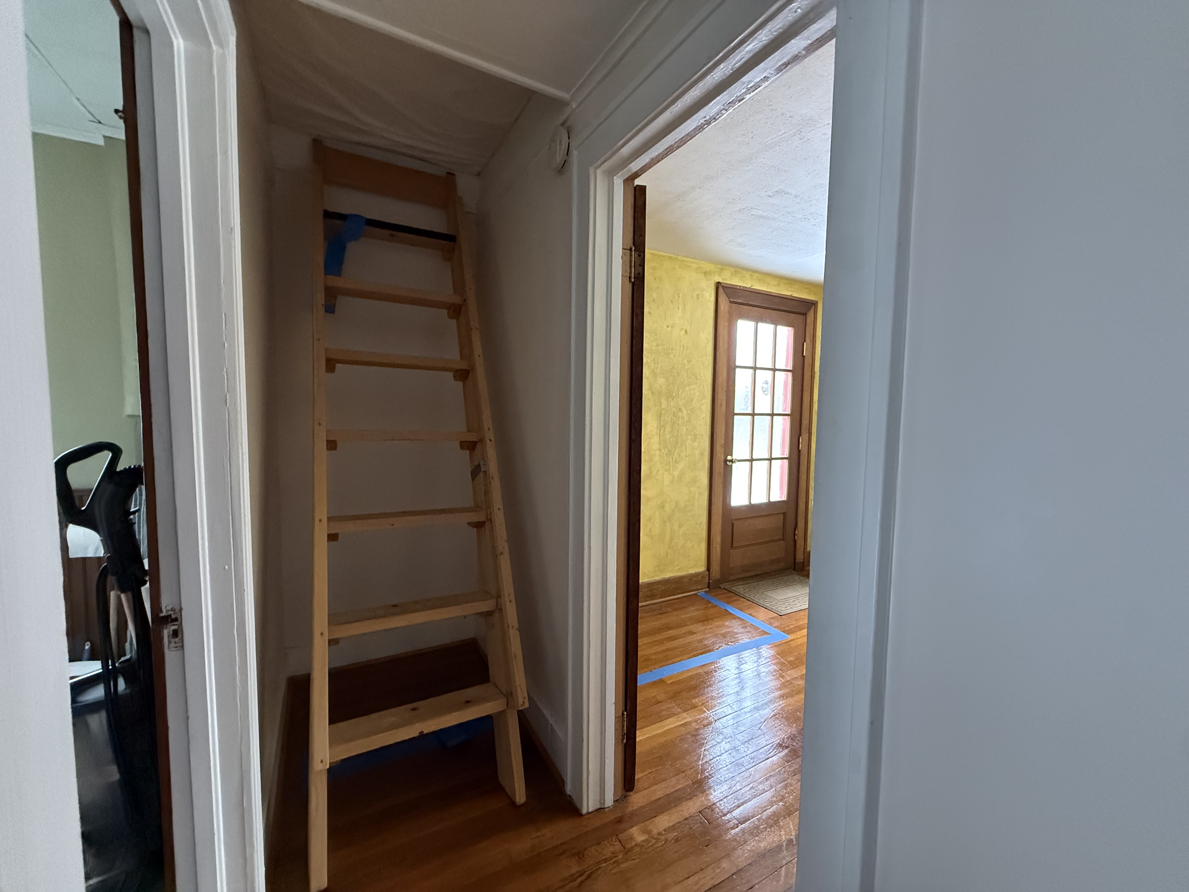 Condition of the second-floor living area before opening up the floor plan
