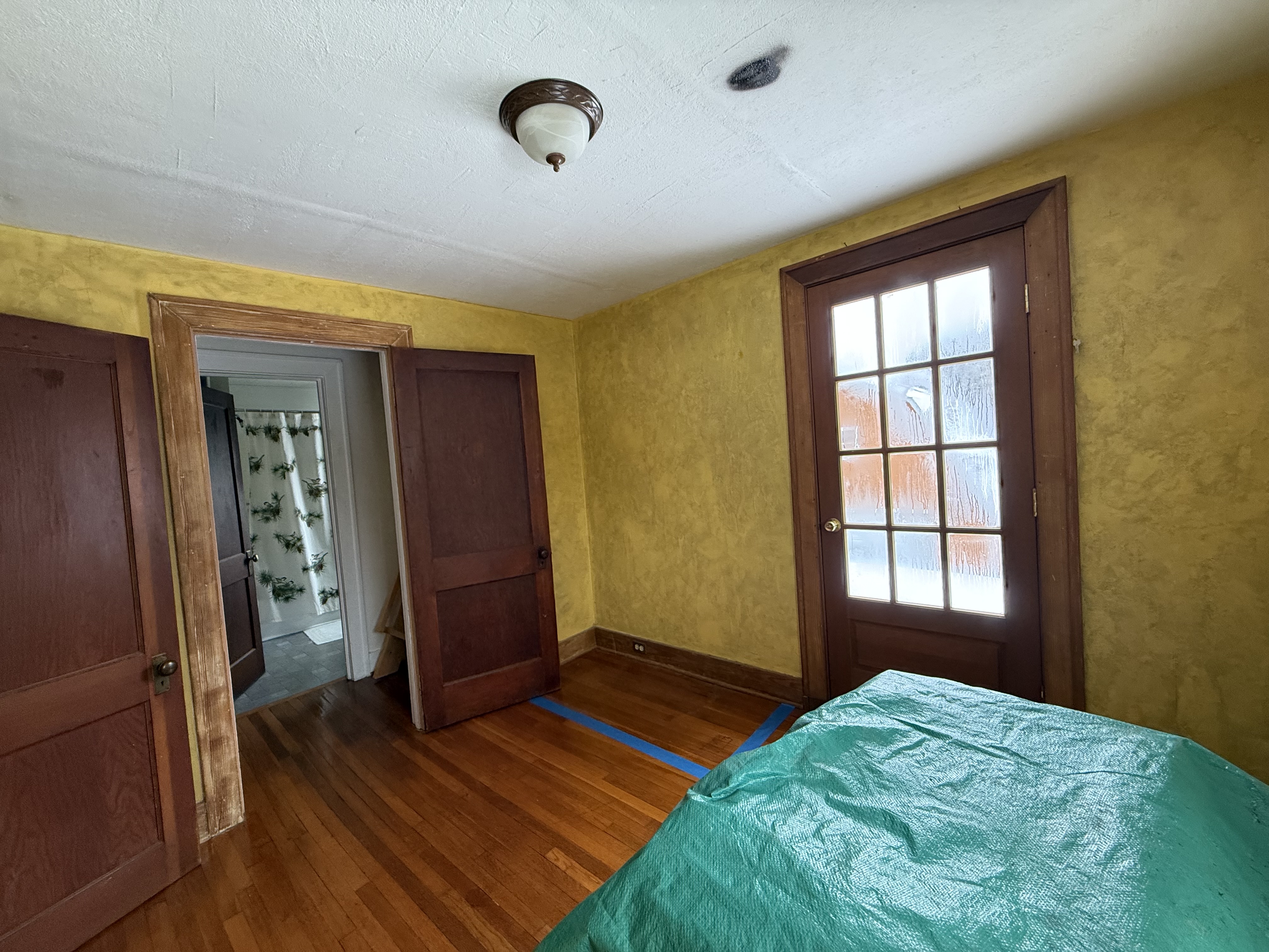 Pre-construction view of the interior space targeted for an open-concept conversion