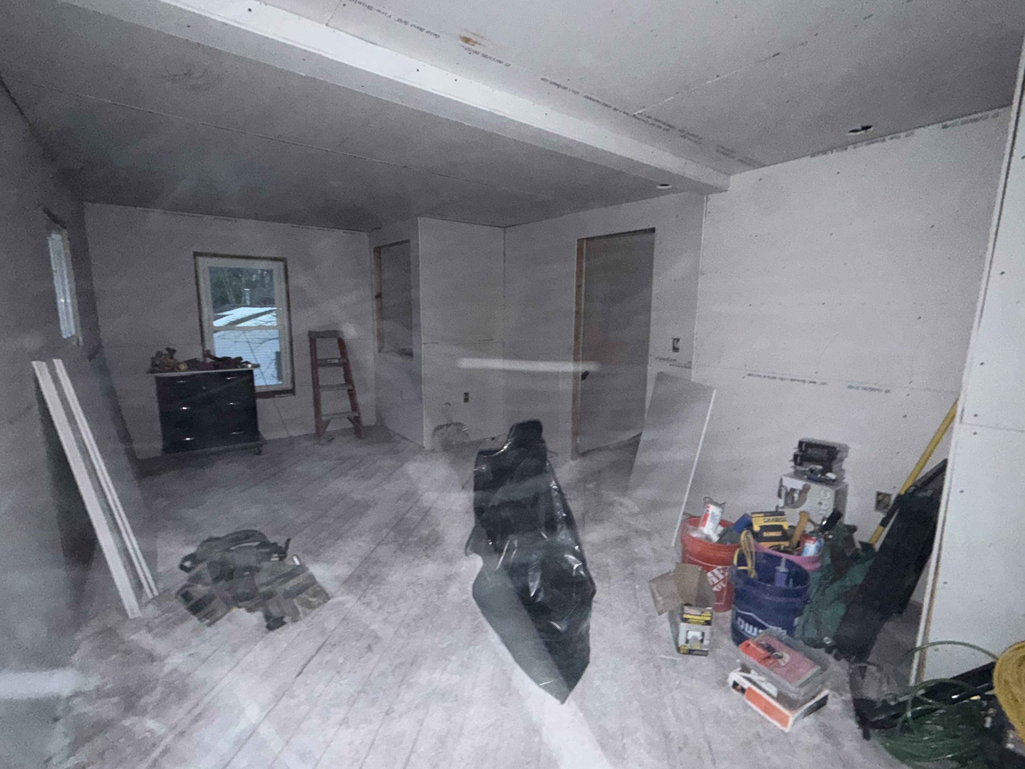 Preparing the freshly renovated second-floor living space for final finishes