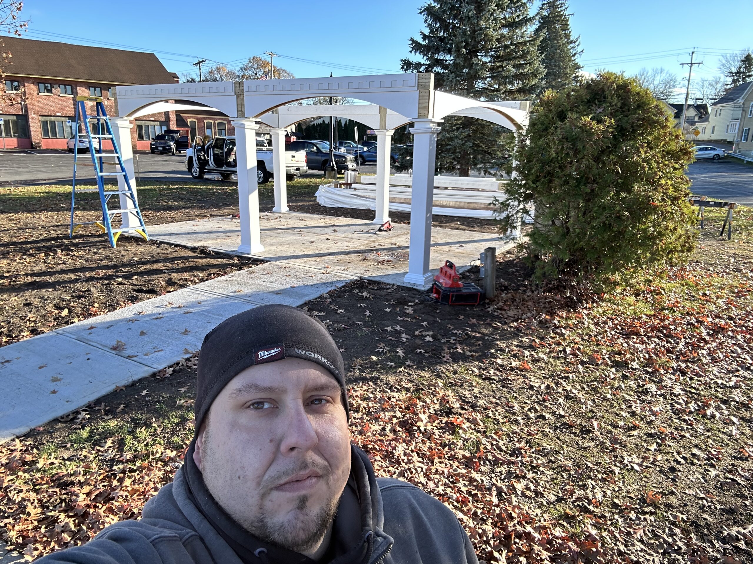 Roofing and structural support installation during the Mattydale pavilion build