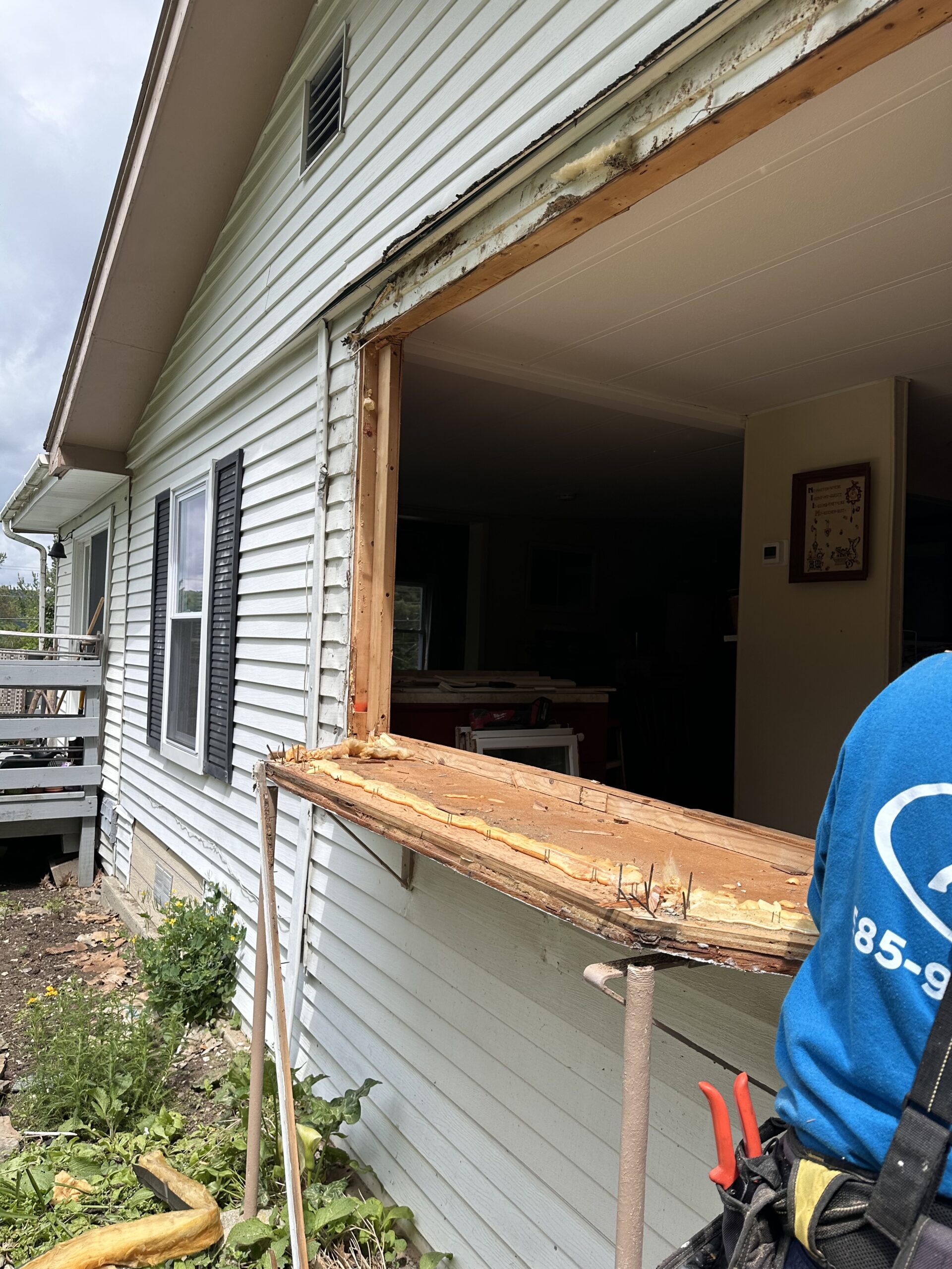 Before photo showing old, drafty residential windows requiring replacement in Cayuga County NY