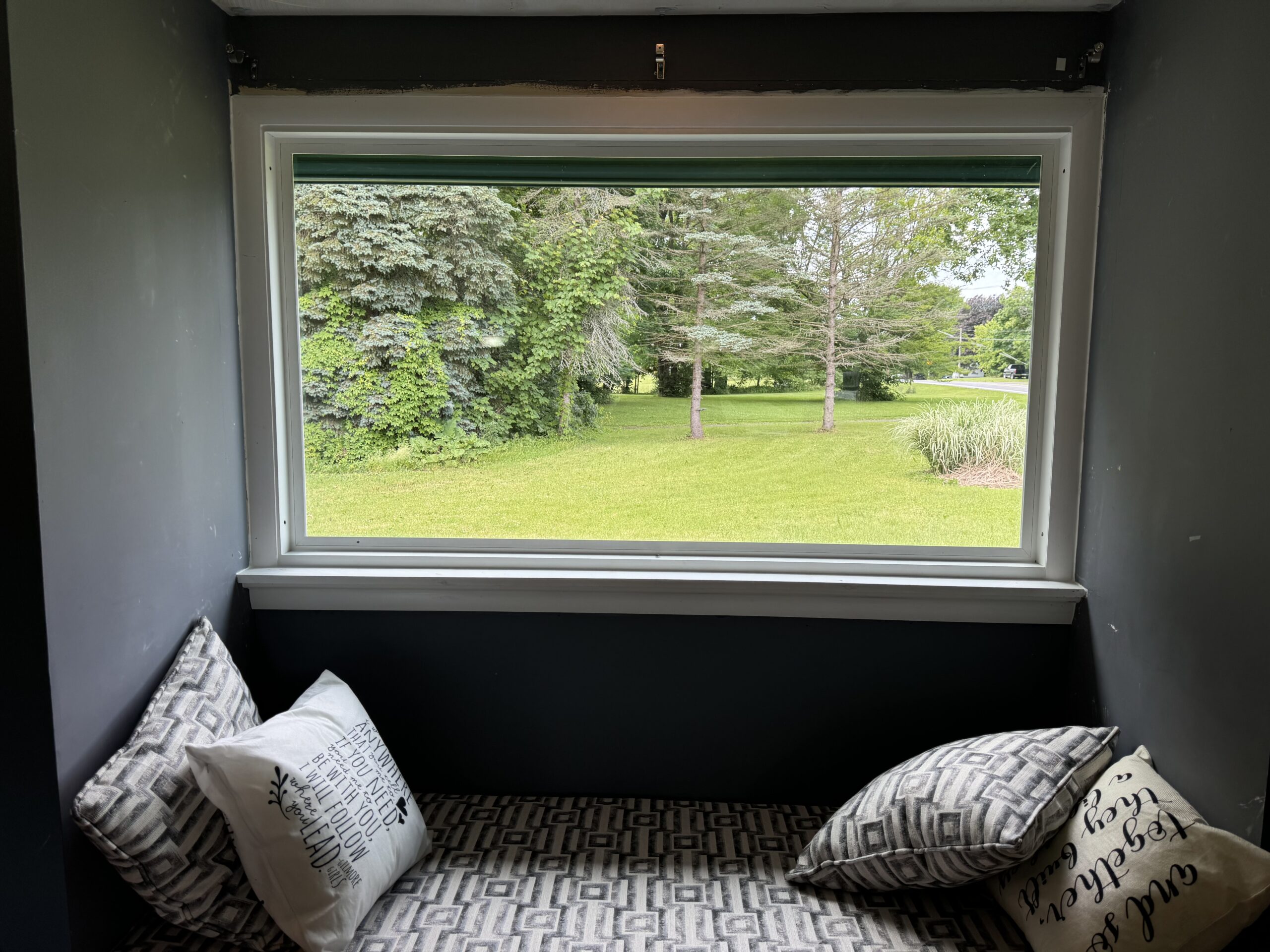 Exterior view of premium vinyl window replacements providing upgraded curb appeal in Central New York