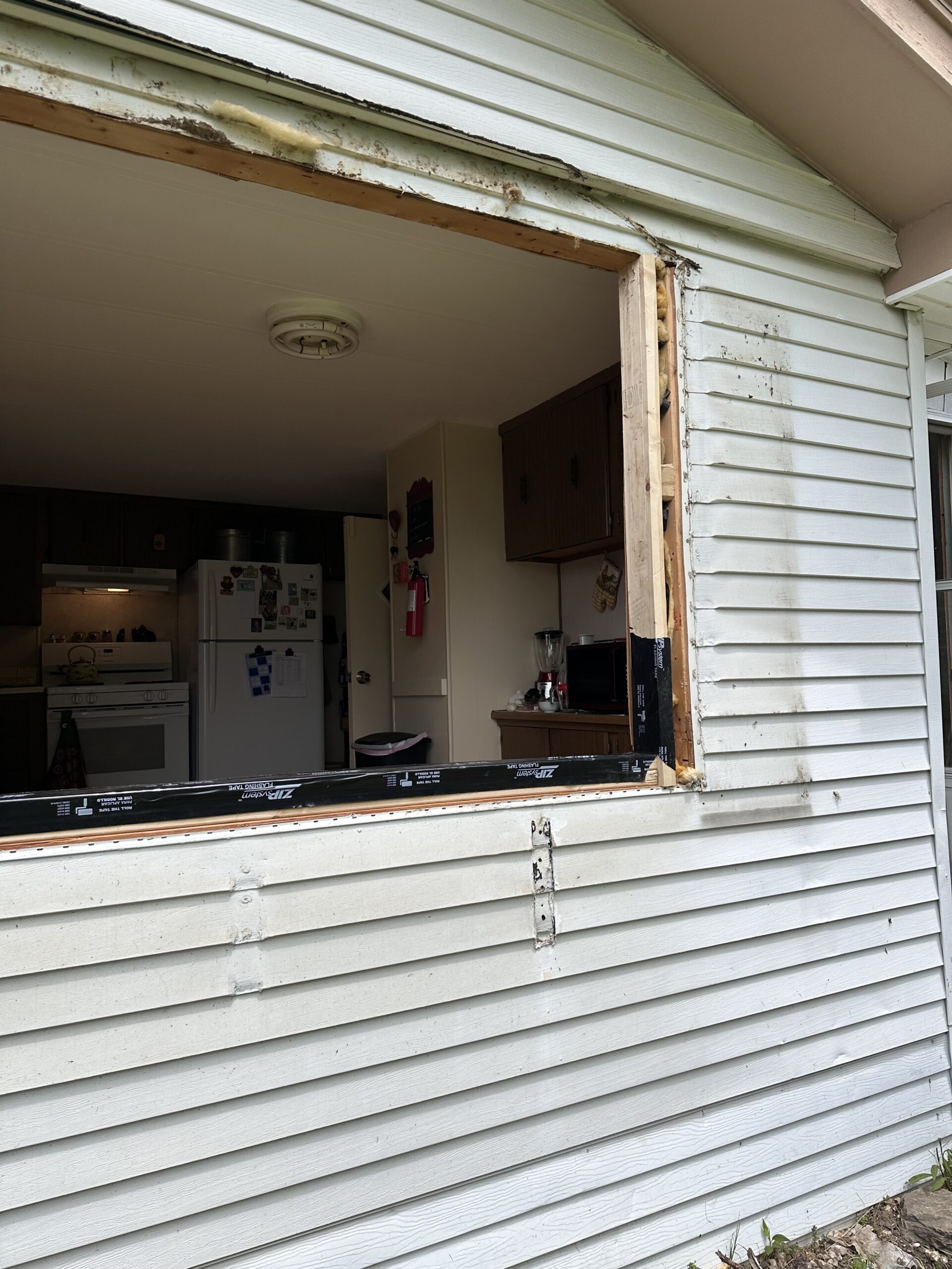 Close-up of outdated, inefficient window frames needing professional contracting replacement