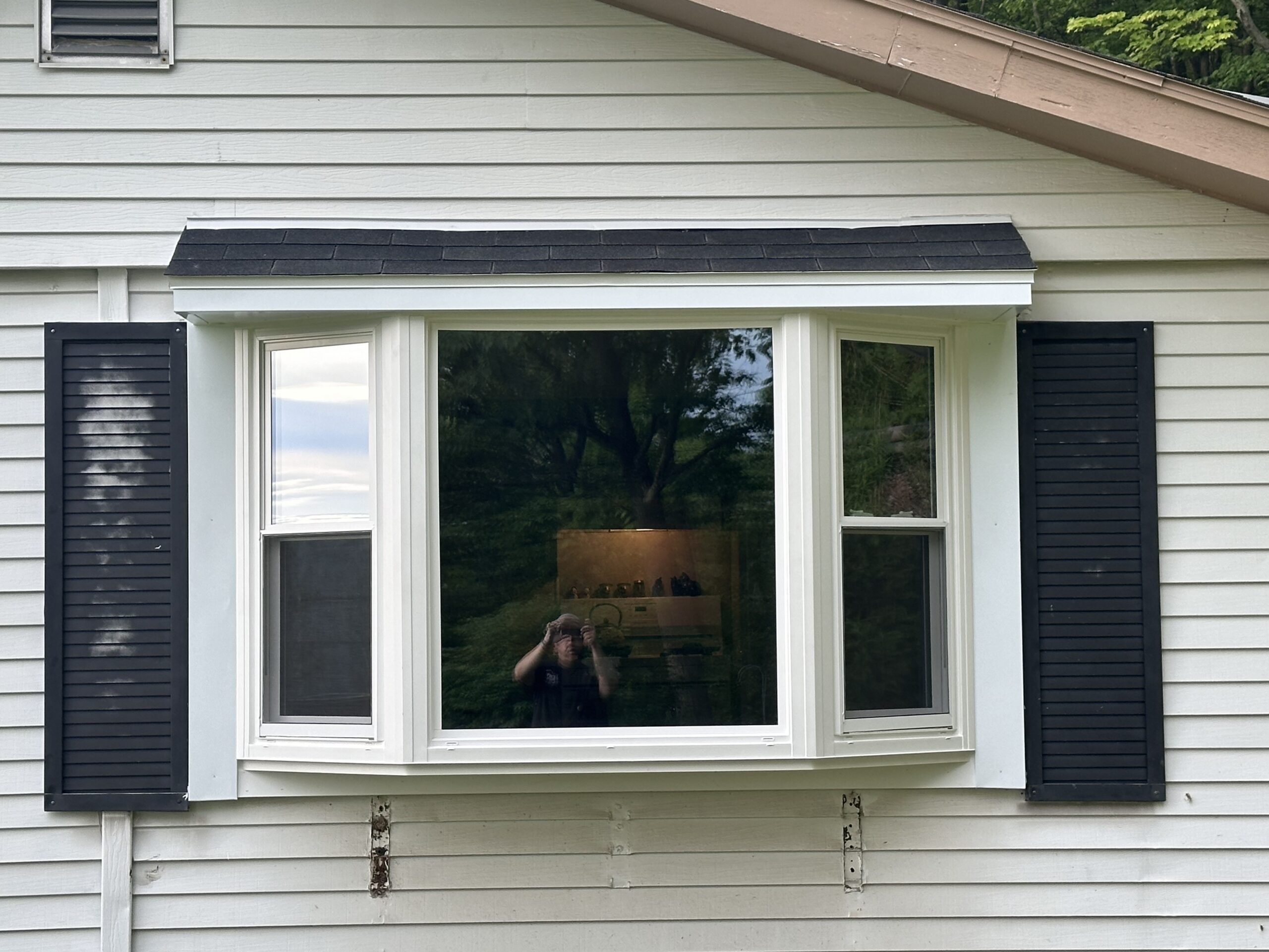 Interior view of bright, clear new vinyl windows enhancing natural light in a Cayuga County home