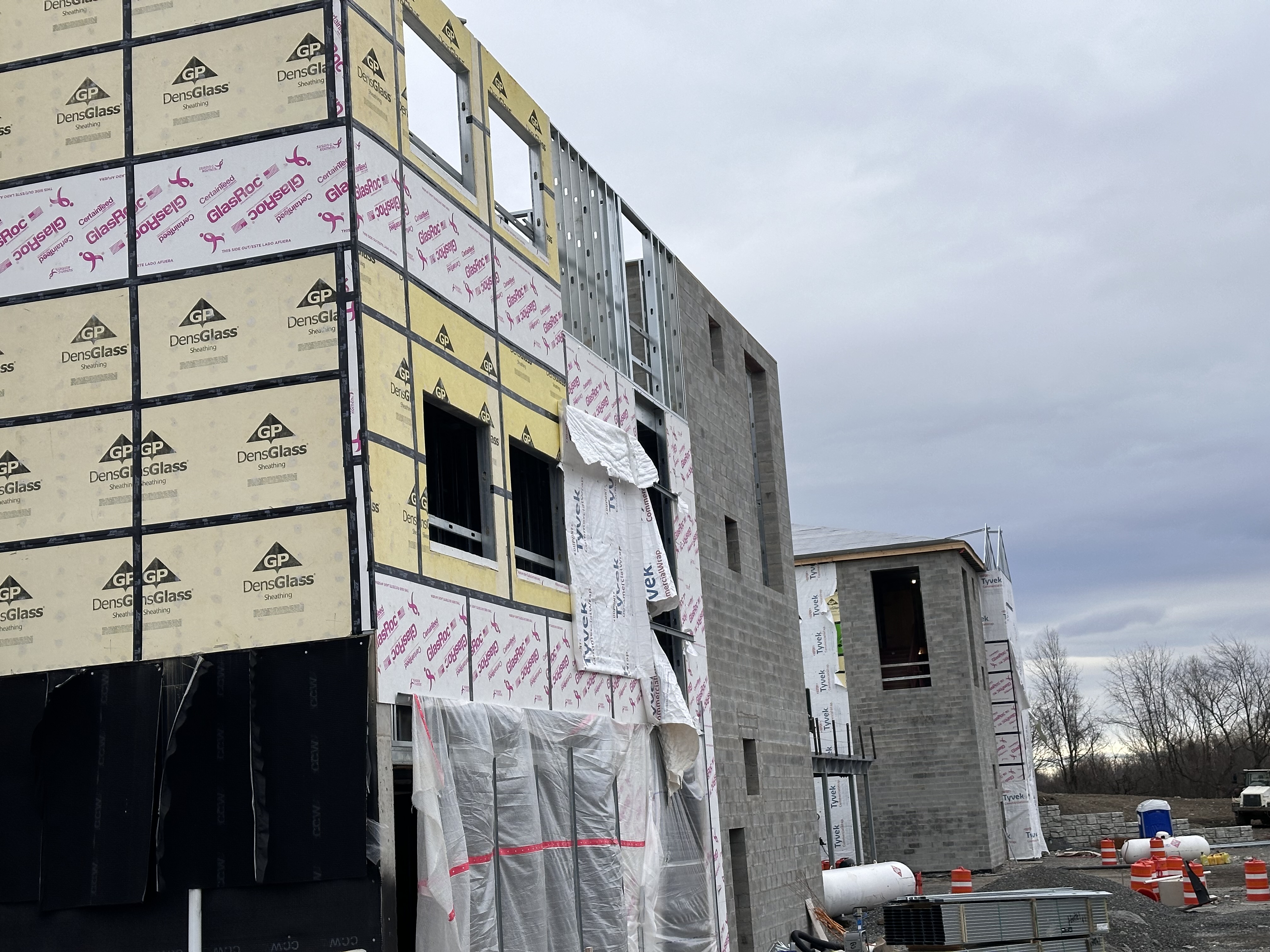 Pre-installation view of the commercial building facade in Skaneateles New York